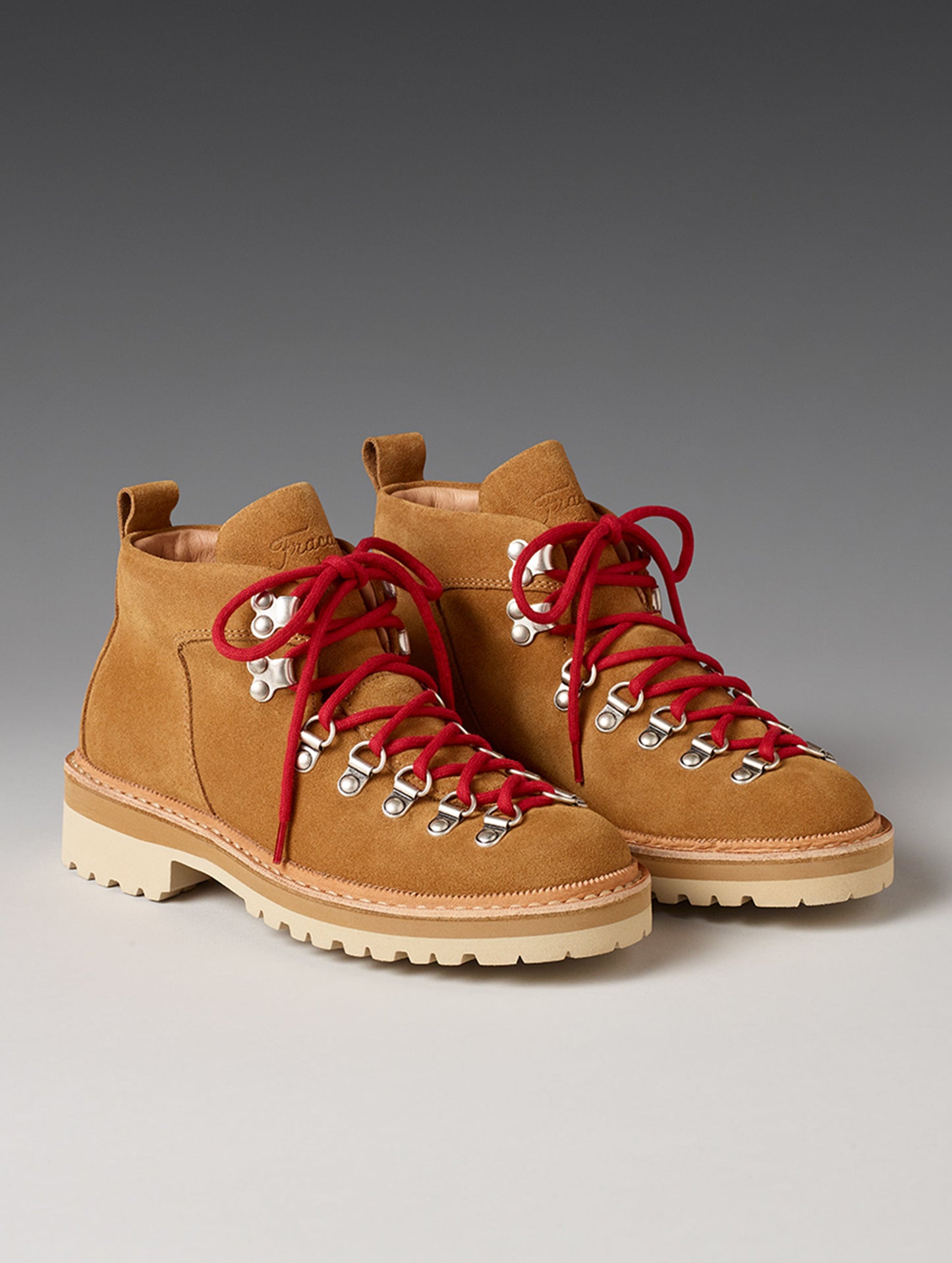 Front angled view of women’s Dolomite Boot in Camel from AETHER Apparel with red laces.