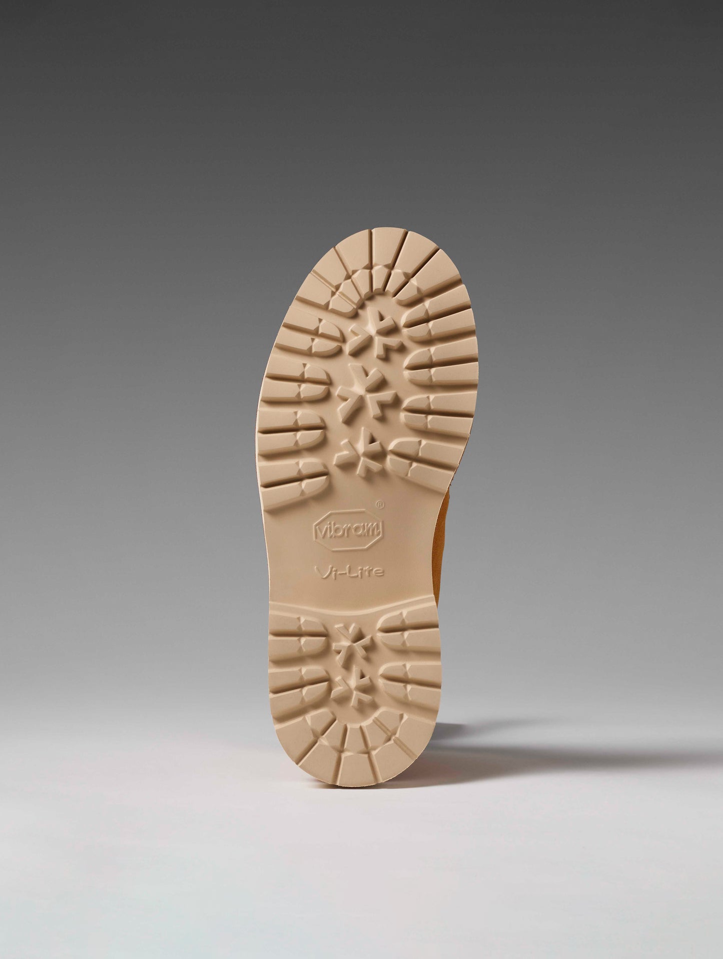 View of Vibram Vi Lite outsole on bottom of women's Dolomite Boot with Shearling in Camel from AETHER Apparel.