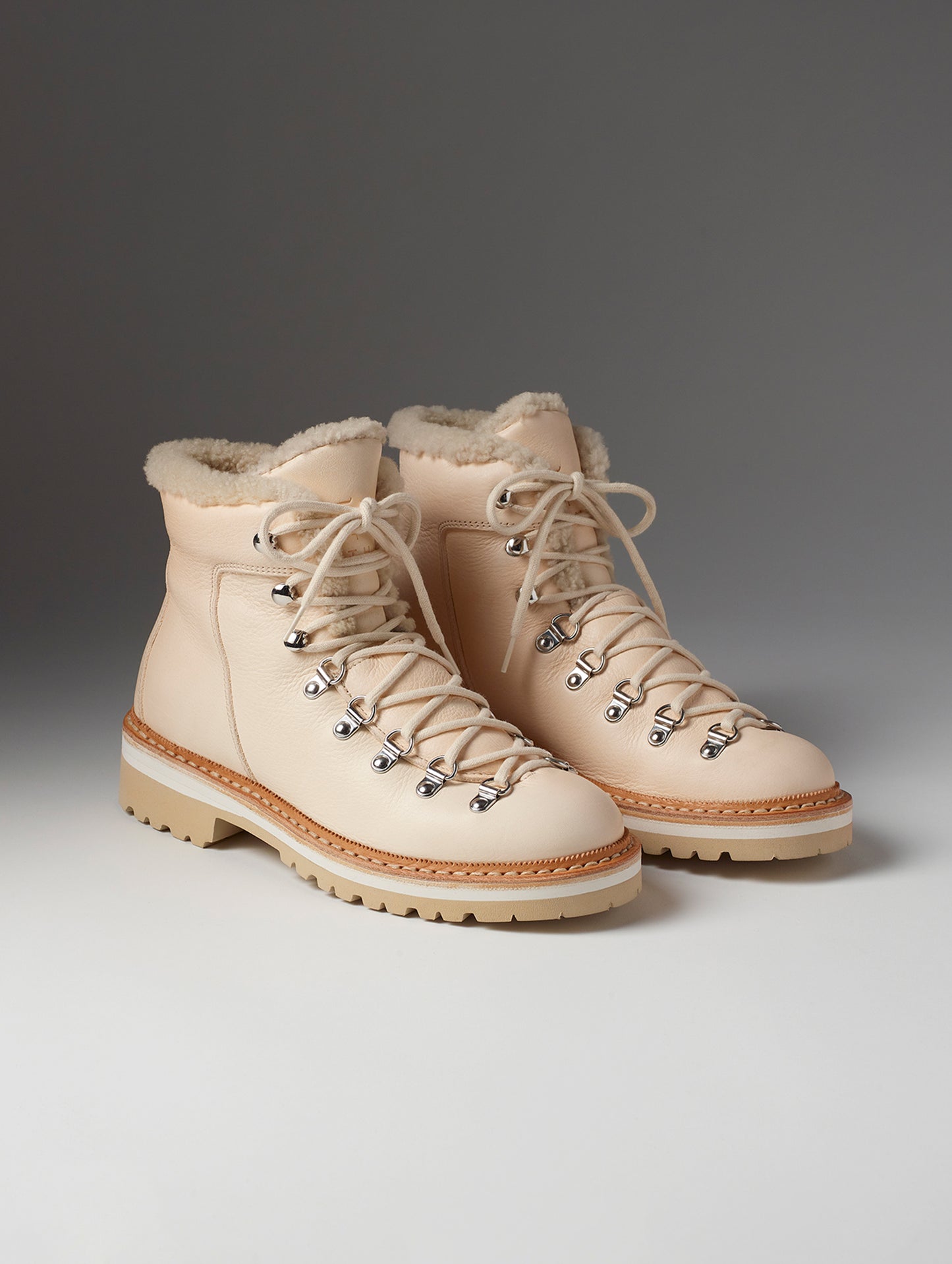 Front angled view of women's Dolomite Boot with Shearling in Cream from AETHER Apparel with cream laces.