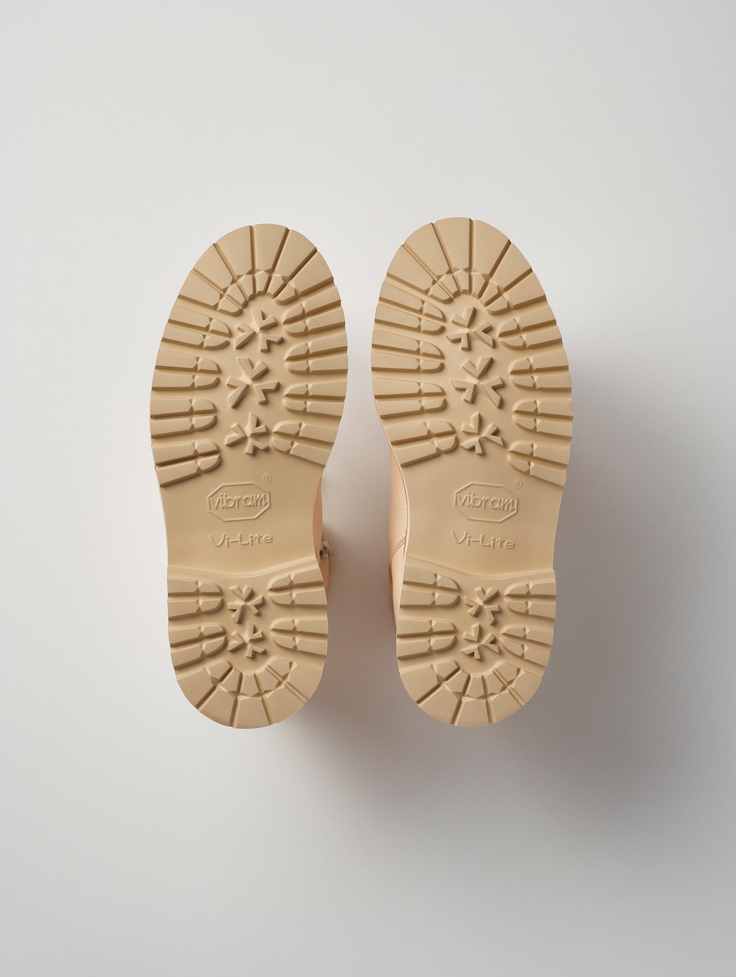 View of Vibram Vi Lite outsoles on bottom of women's Dolomite Boot with Shearling in Cream from AETHER Apparel.