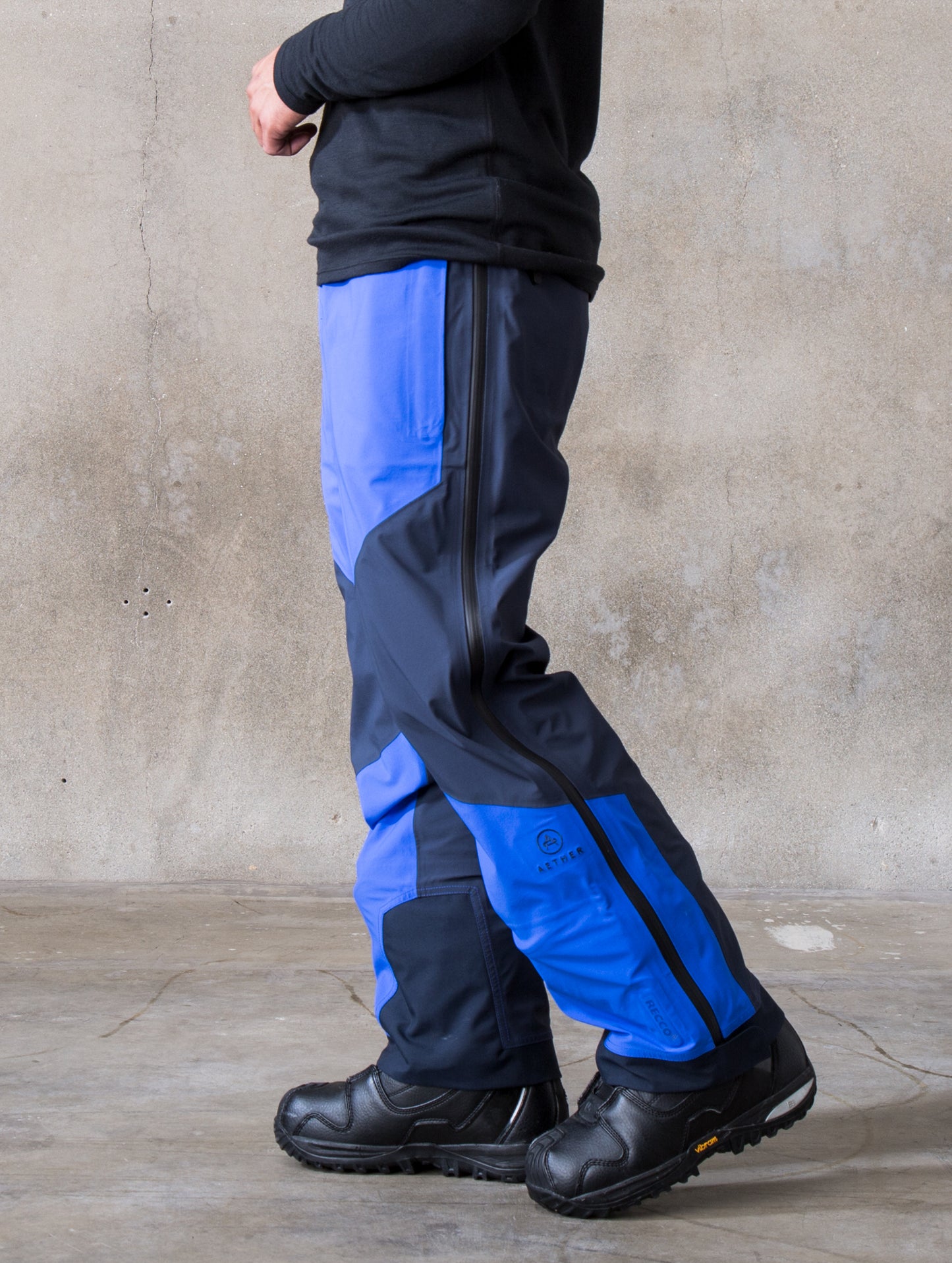 Left side view of man wearing Fusion Pant from AETHER Apparel.