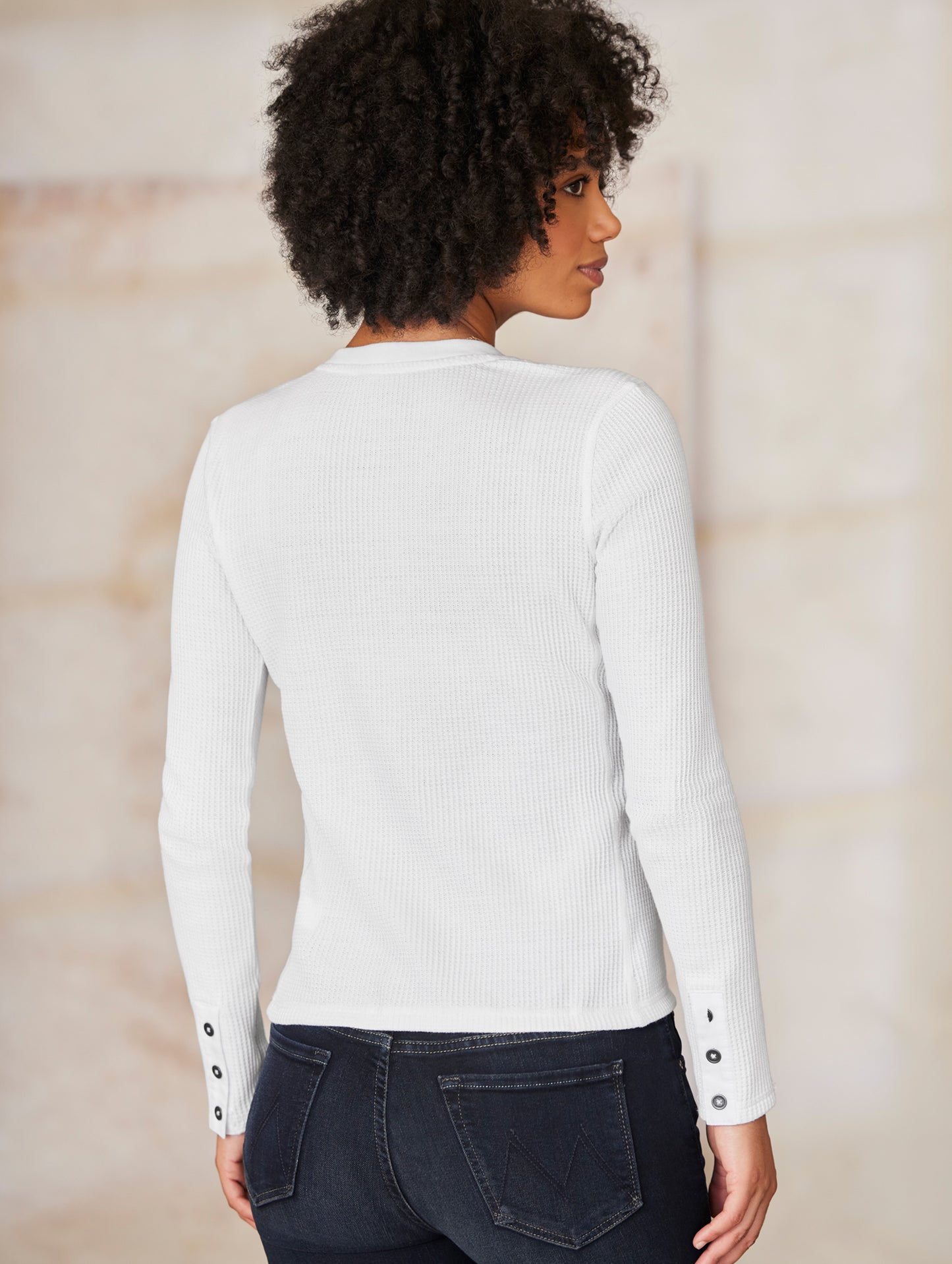 woman wearing white long sleeve henley