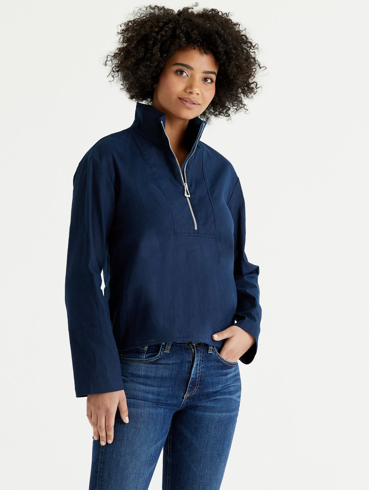 woman wearing dark blue anorak