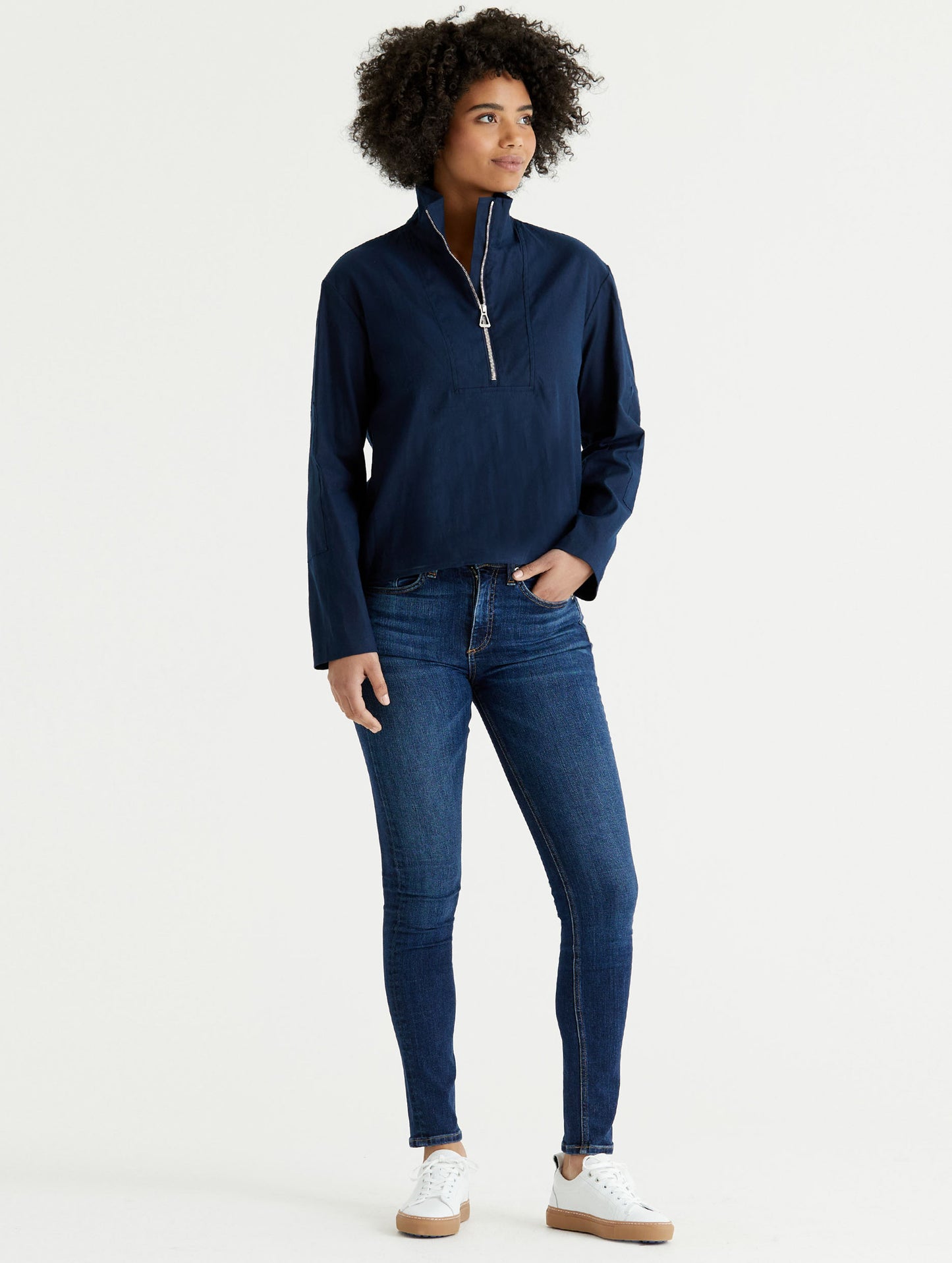 woman wearing dark blue anorak