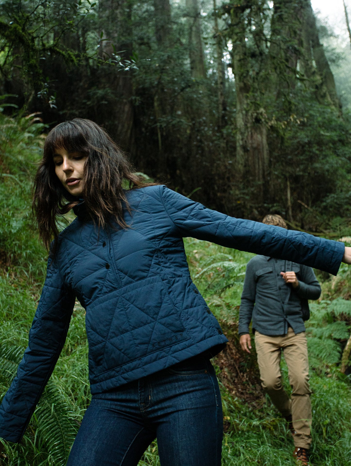 woman wearing blue pullover