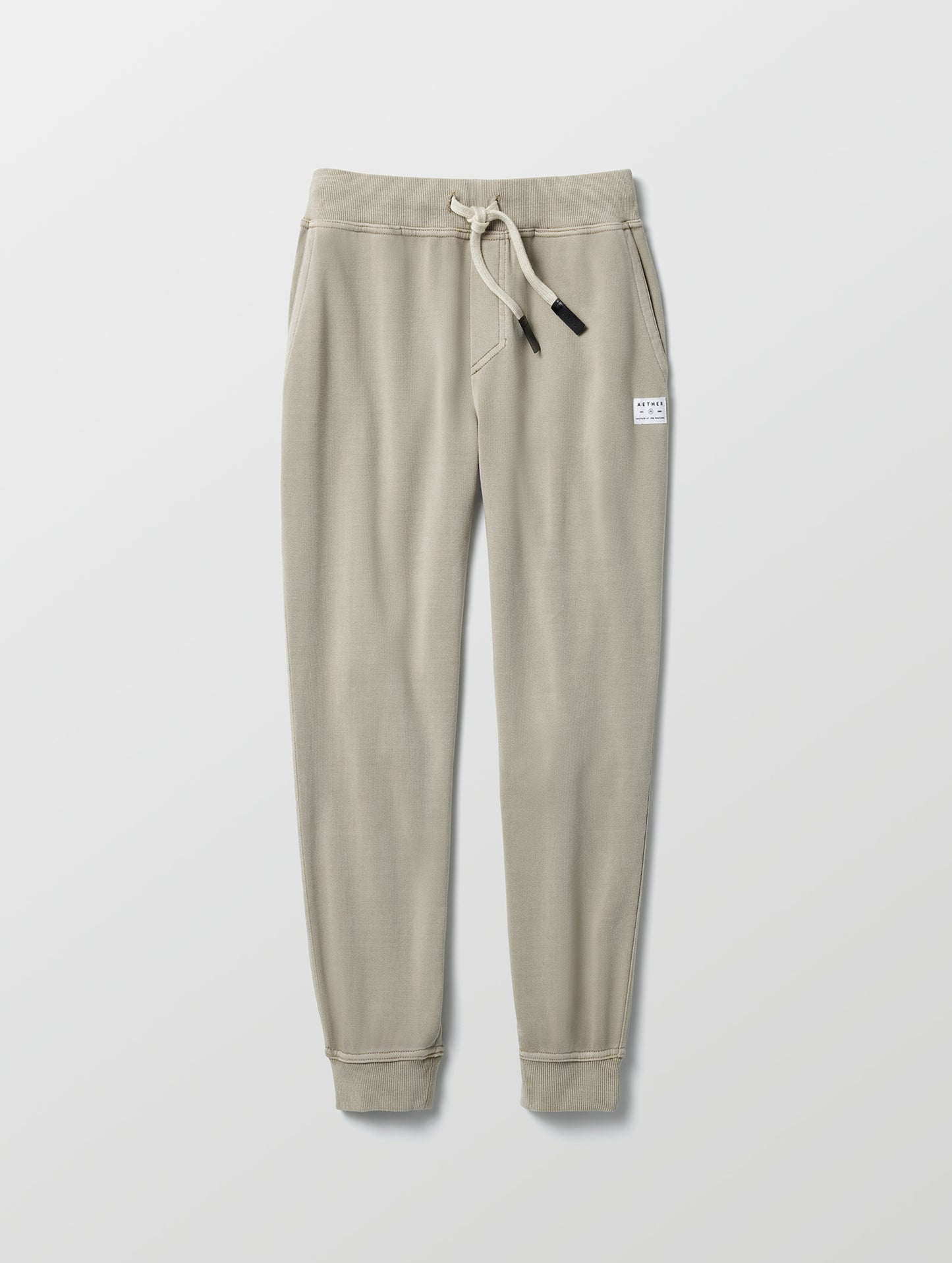 Flat lay of women's Solstice Lightweight Jogger in Laurel Grey from AETHER Apparel.
