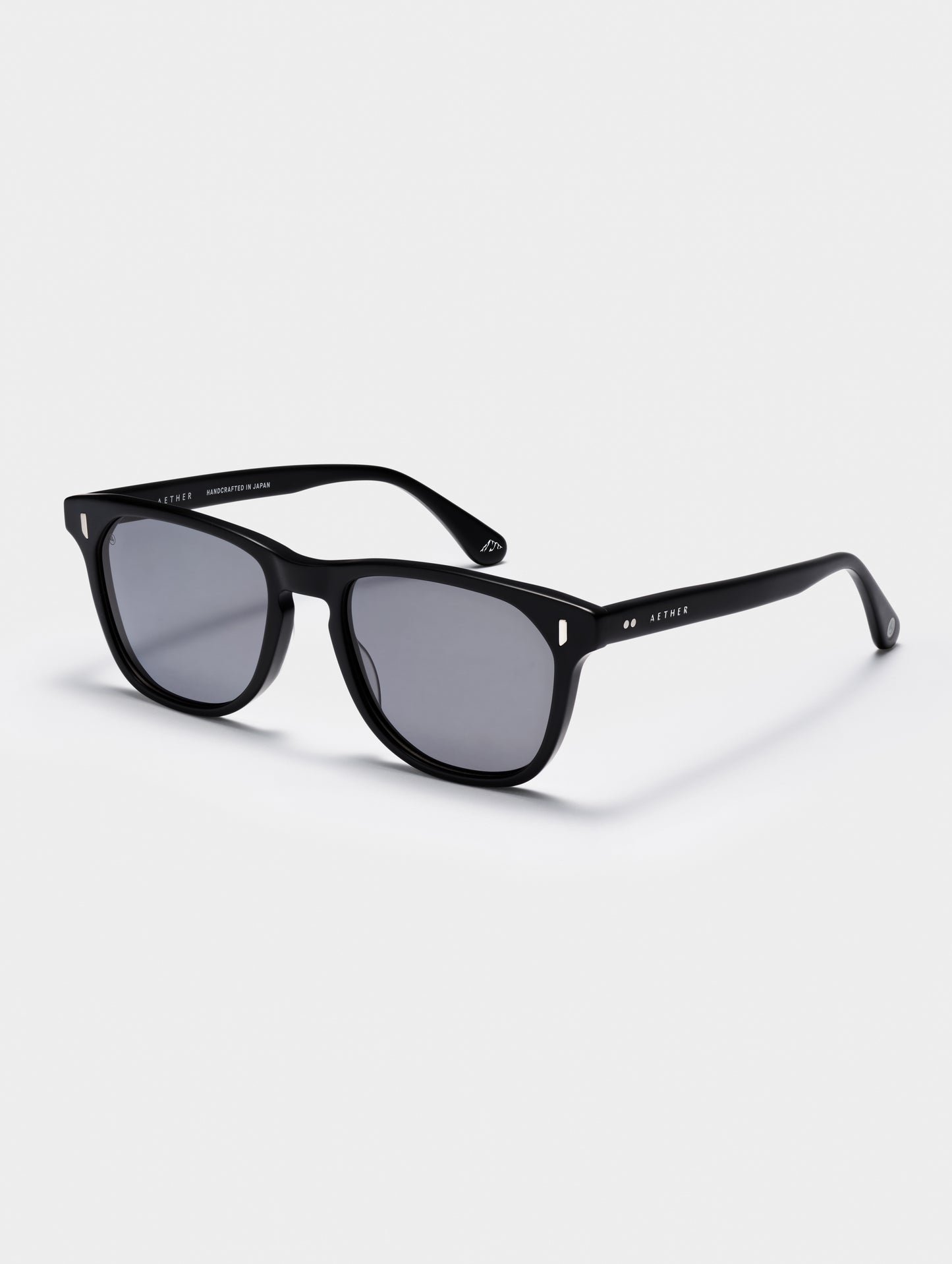 Front 3/4 view of Yosemite Sunglass in Matte Black with Grey Lens from AETHER Apparel.