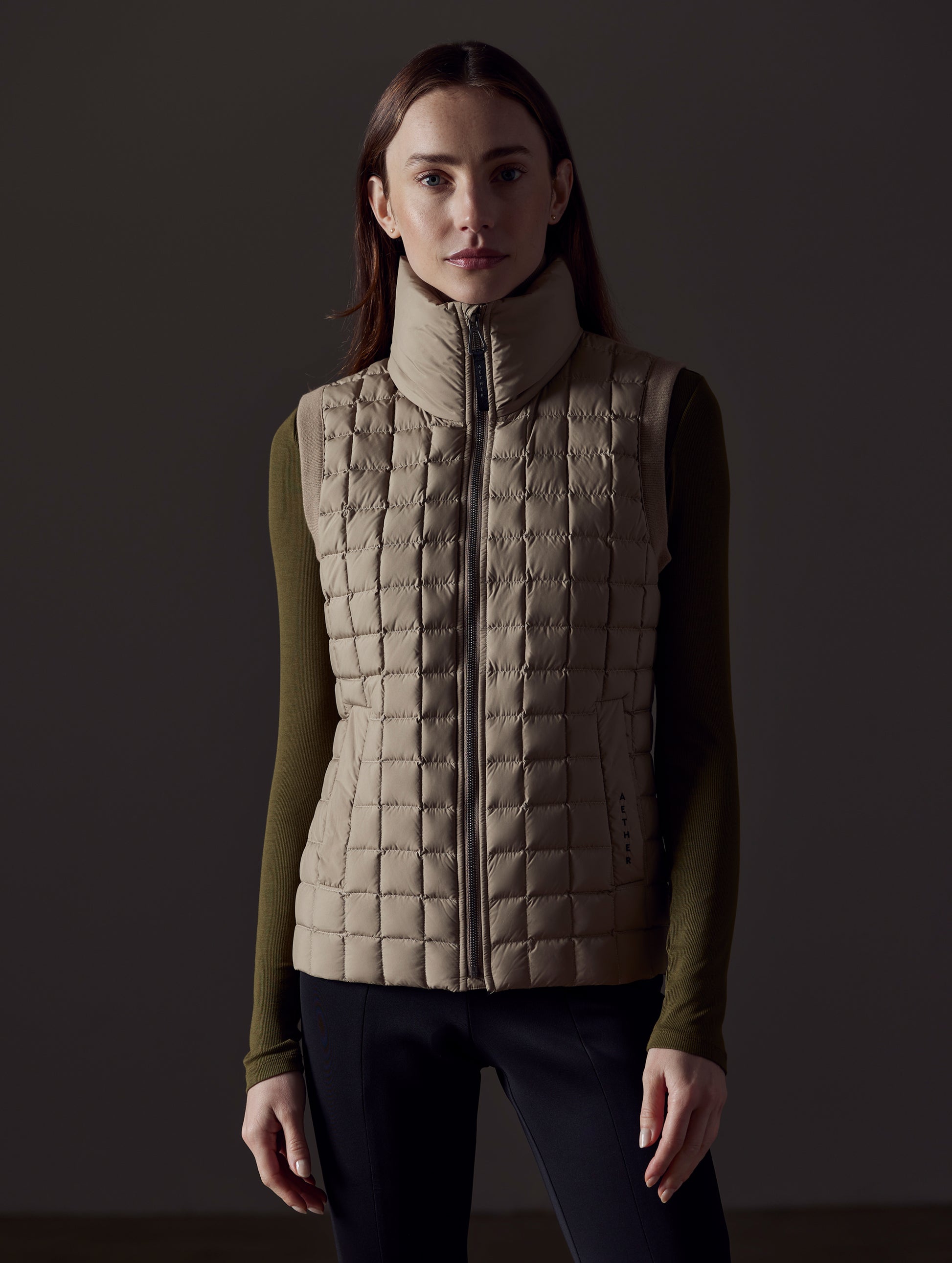 woman wearing brown vest from AETHER Apparel