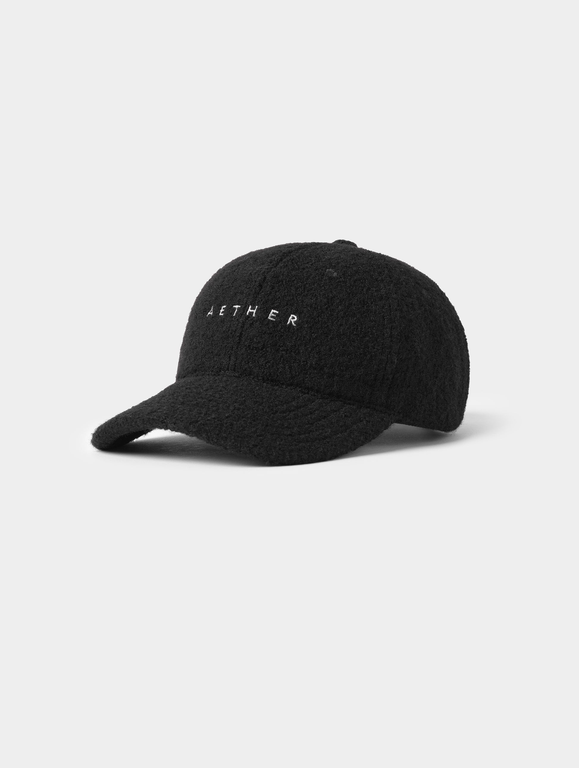 Front angled view of Aura Wool Hat in Onyx Black from AETHER Apparel. 