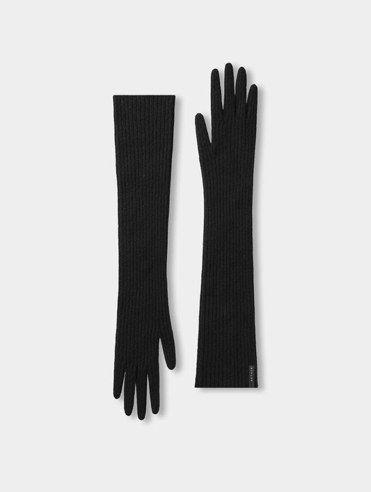 Flat lay of the women’s Astra Ribbed Sweater Gloves in Onyx Black, full-length cashmere gloves in a 2x2 rib knit.