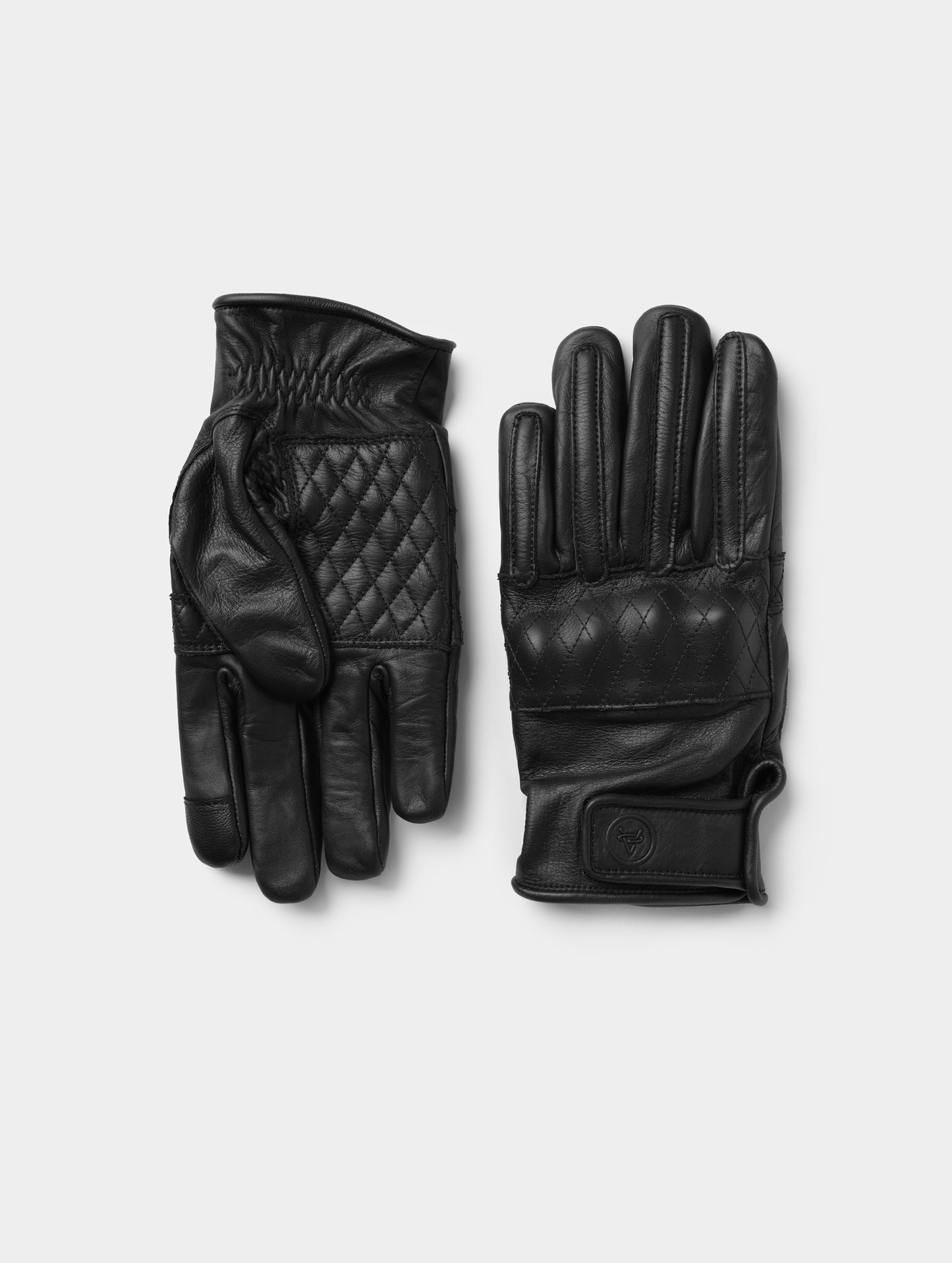 Flat lay view of the top and bottom of the Circuit Moto Glove in Onyx Black from AETHER Apparel. 