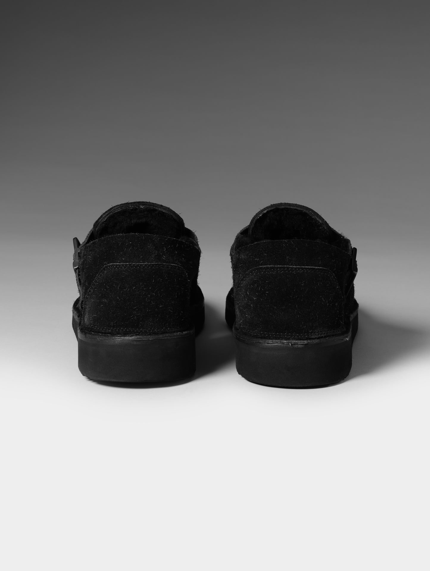 Rear studio shot of the Sam Buckle Shoe in Onyx Black from AETHER Apparel.