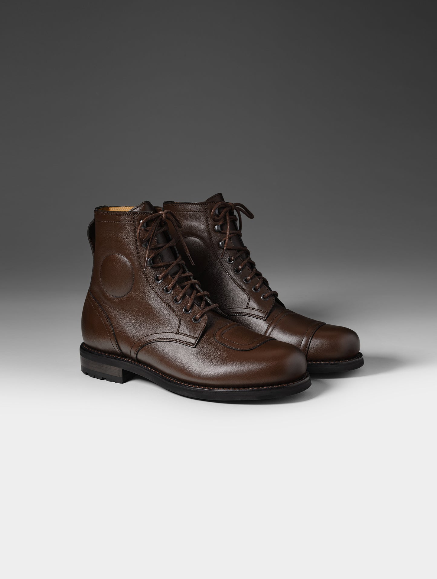 Front 3/4 studio shot of the Tioga Moto Boot in Espresso Brown with brown laces from AETHER Apparel.