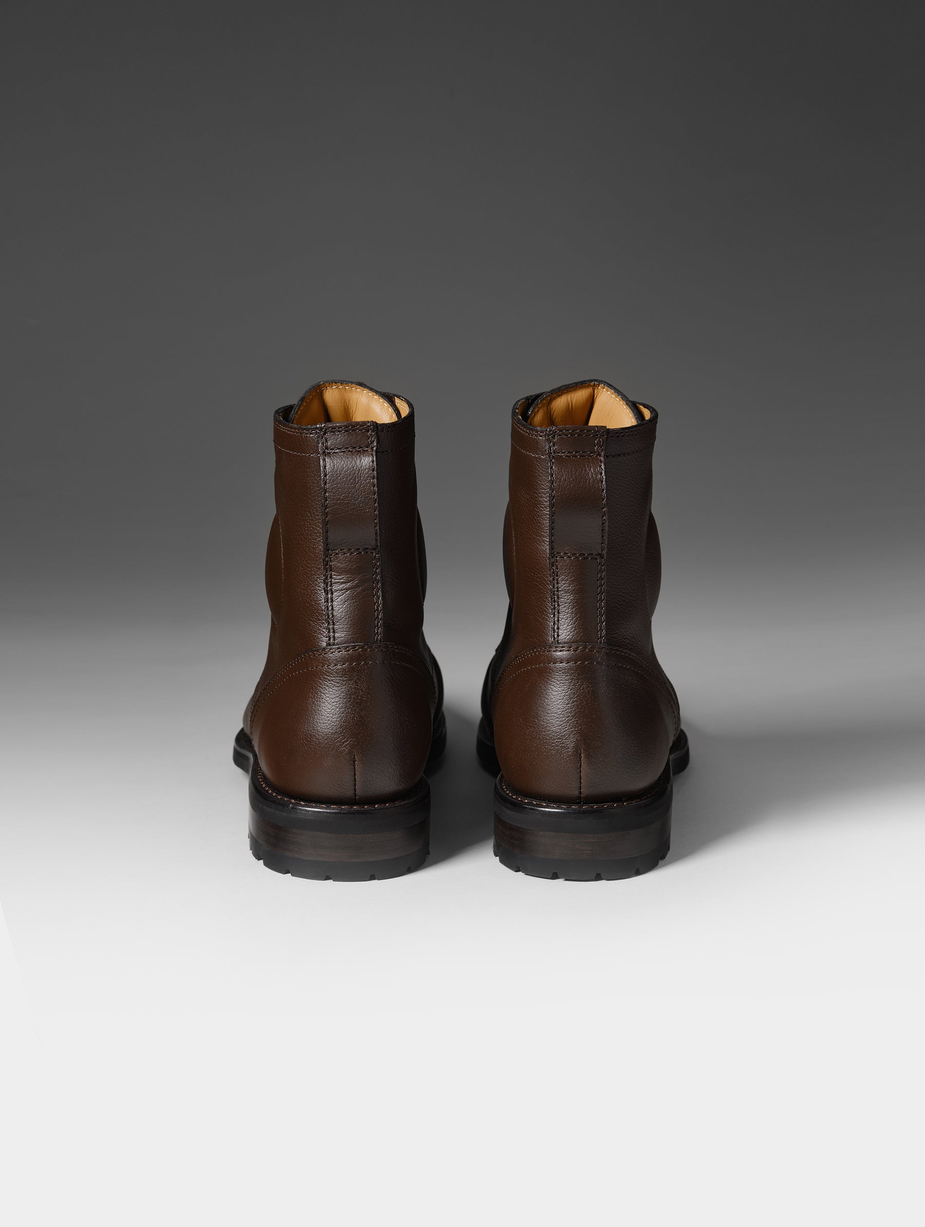 Rear studio shot of the Tioga Moto Boot in Espresso Brown with brown laces from AETHER Apparel.