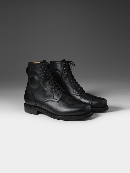 Front 3/4 studio shot of the Tioga Moto Boot in Onyx Black with black laces from AETHER Apparel.