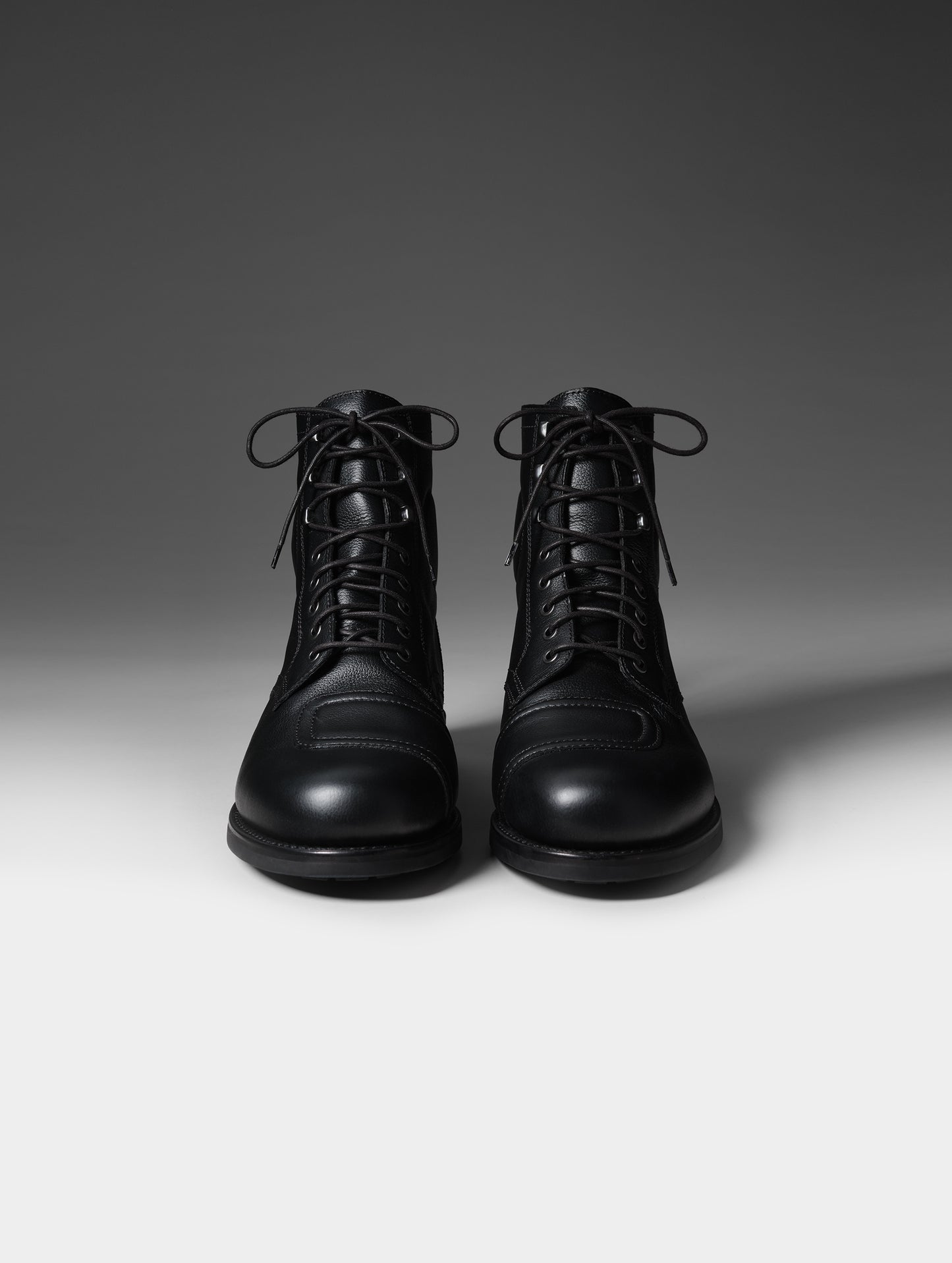 Front studio shot of the Tioga Moto Boot in Onyx Black with black laces from AETHER Apparel.