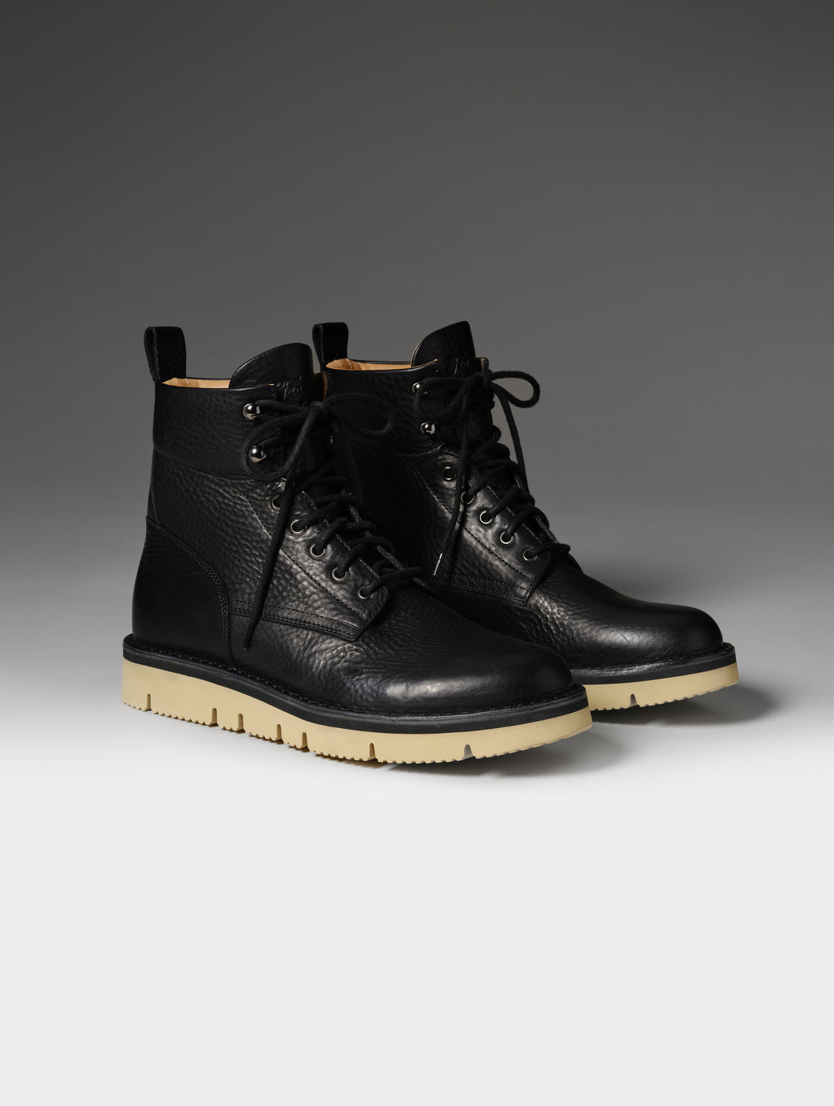 Front 3/4 studio shot of the Canyon Boot in Onyx Black with black laces from AETHER Apparel.