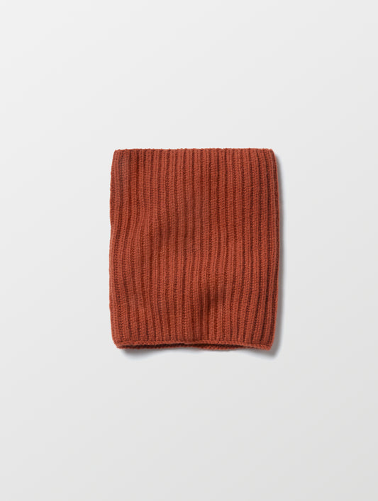 Flat lay of the Cashmere Neck Gaiter in Redwood Rust from AETHER Apparel. 