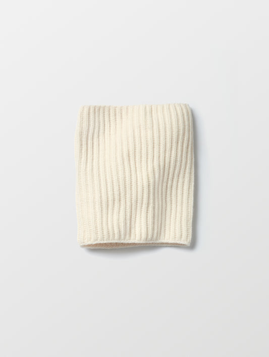 Flat lay of the Cashmere Neck Gaiter in Winter White from AETHER Apparel. 