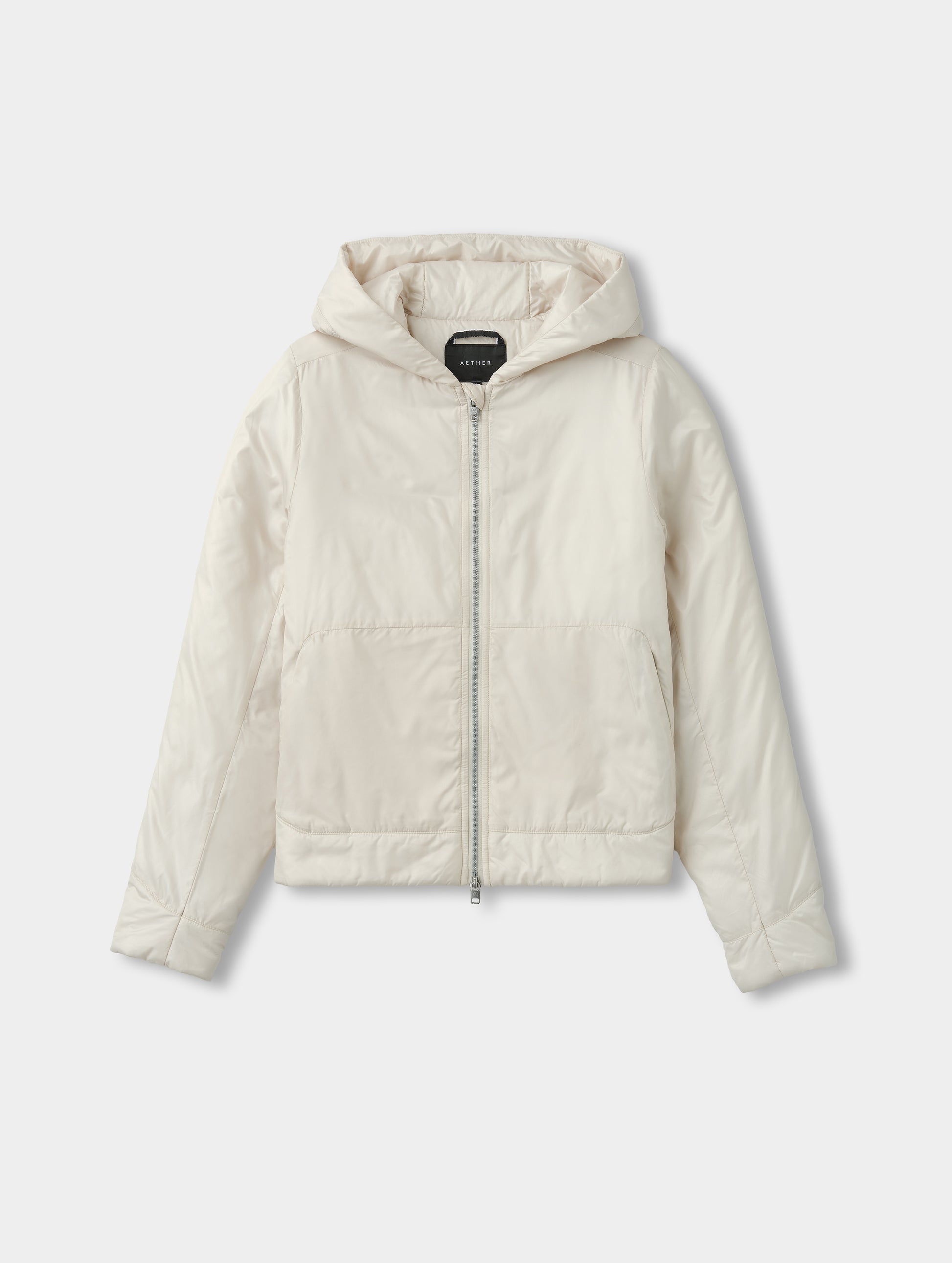 Flat lay view of the Celeste Eco Insulated Hoodie in Bone from AETHER Apparel.