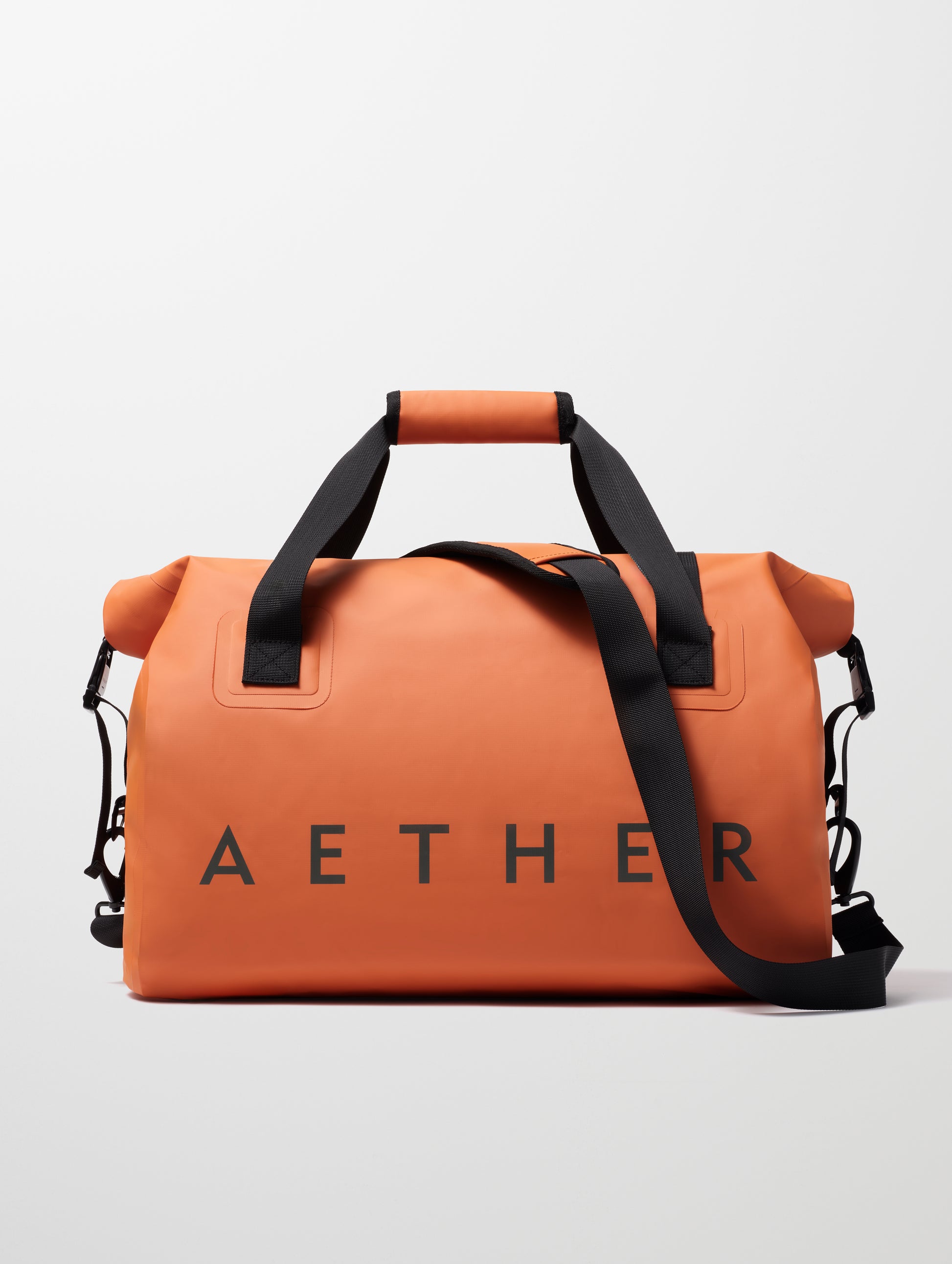 Rear view of Excursion Duffle Bag 45L in Autumn Orange from AETHER Apparel.