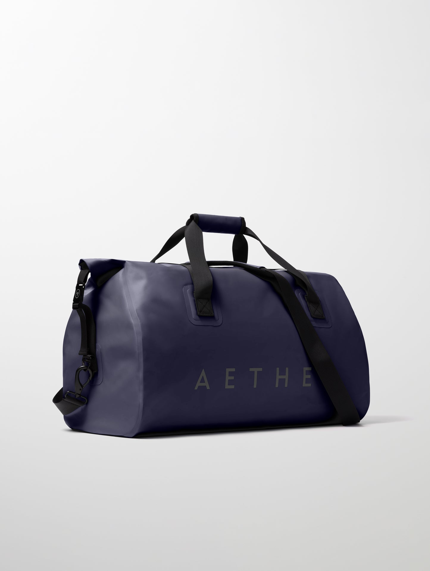 Front angled view of Excursion Duffle Bag 60L in Total Eclipse dark blue from AETHER Apparel.