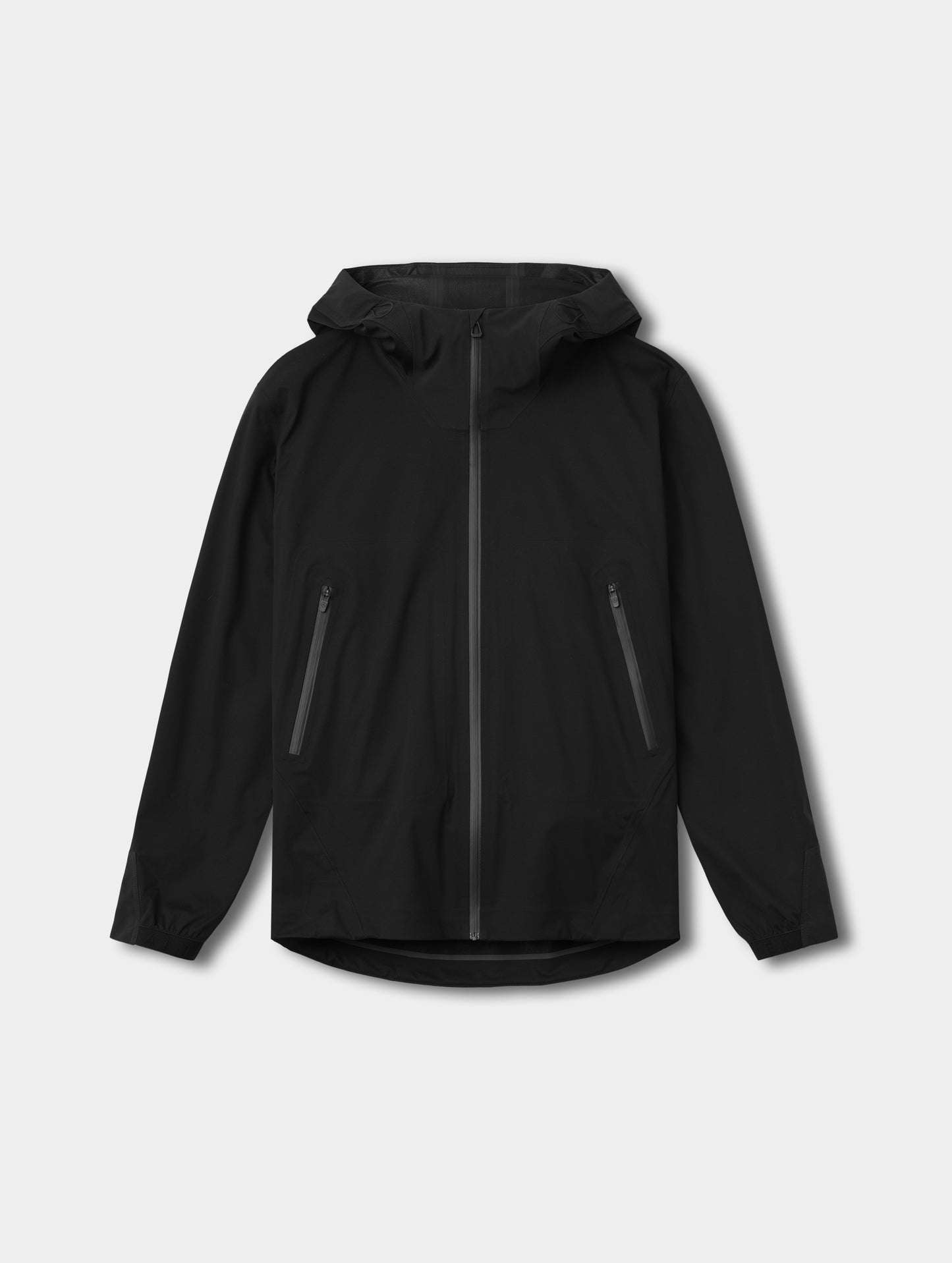 Flat lay view of the Frontier Hooded Shell Jacket in Onyx Black from AETHER Apparel.