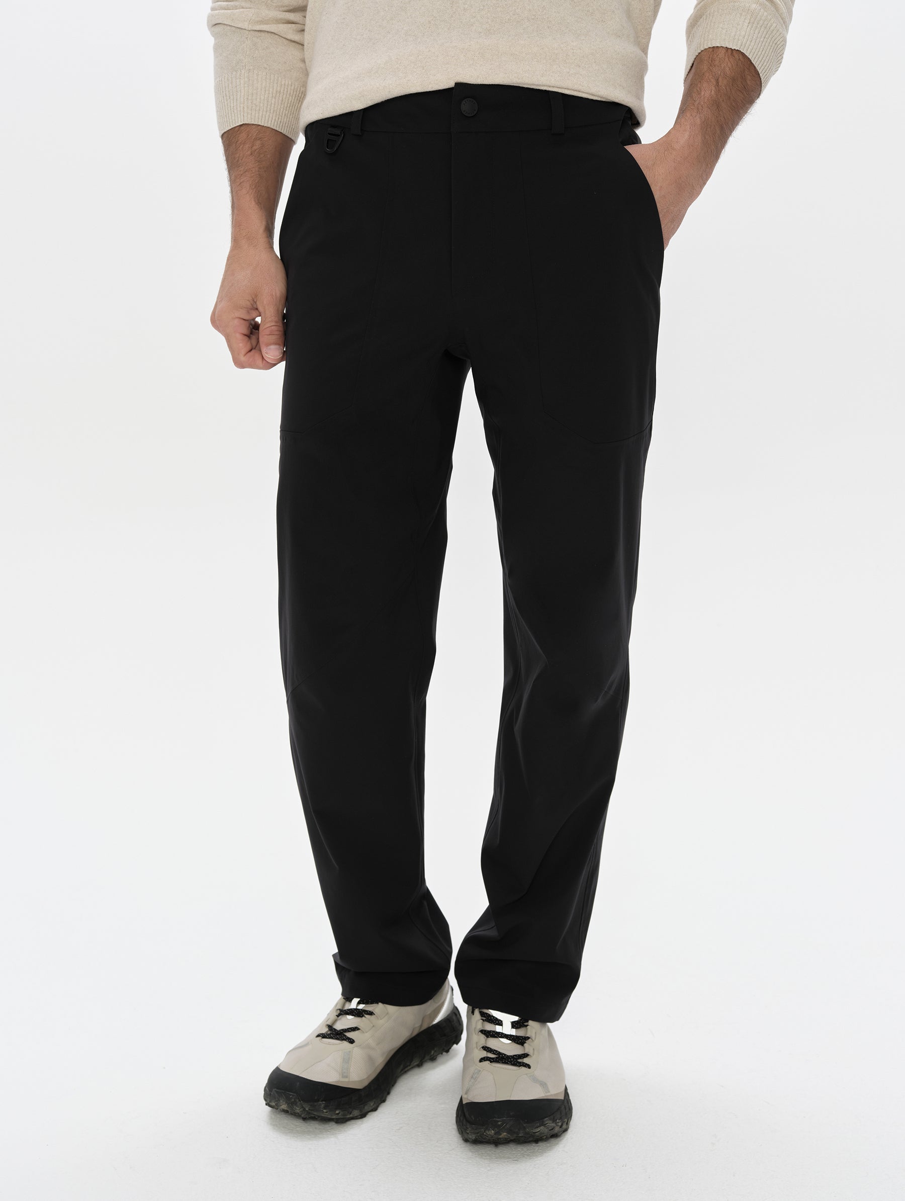 Front, lower-body view of man wearing the Frontier Pant in Onyx Black from AETHER Apparel.