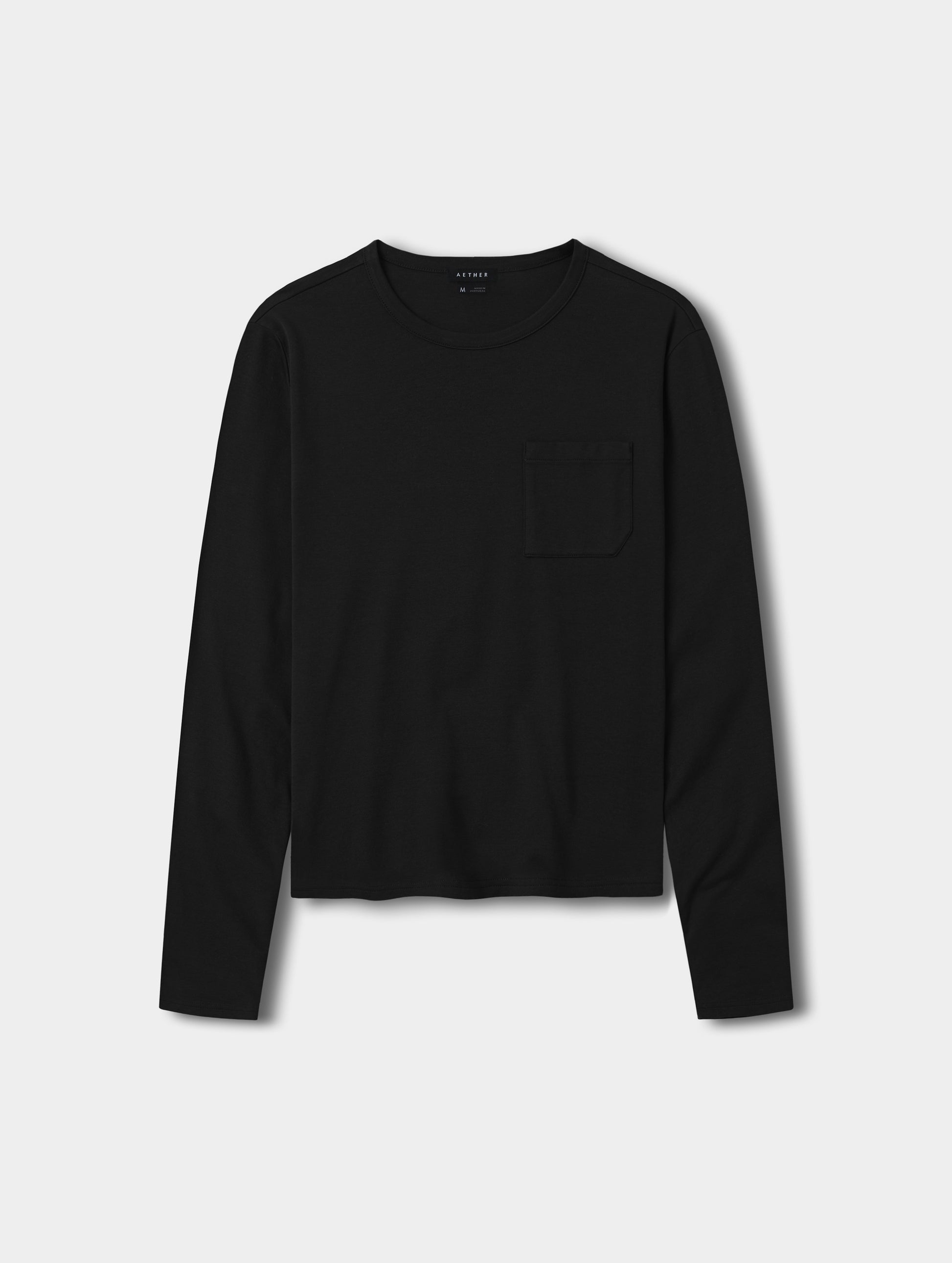 Flat lay view of the Harlow Premium Long-Sleeve Tee in Onyx Black from AETHER Apparel.