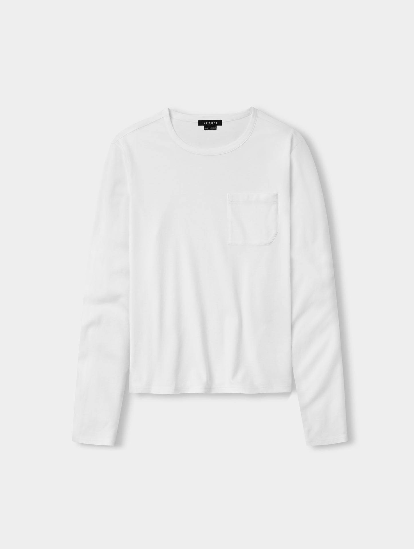 Flat lay view of Harlow Premium Long-Sleeve Tee in White from AETHER Apparel.