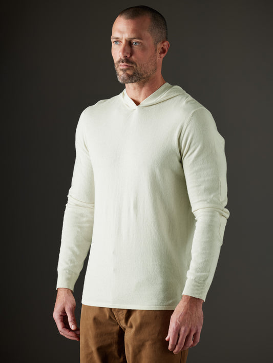 Man wearing  light green hooded sweater from AETHER Apparel