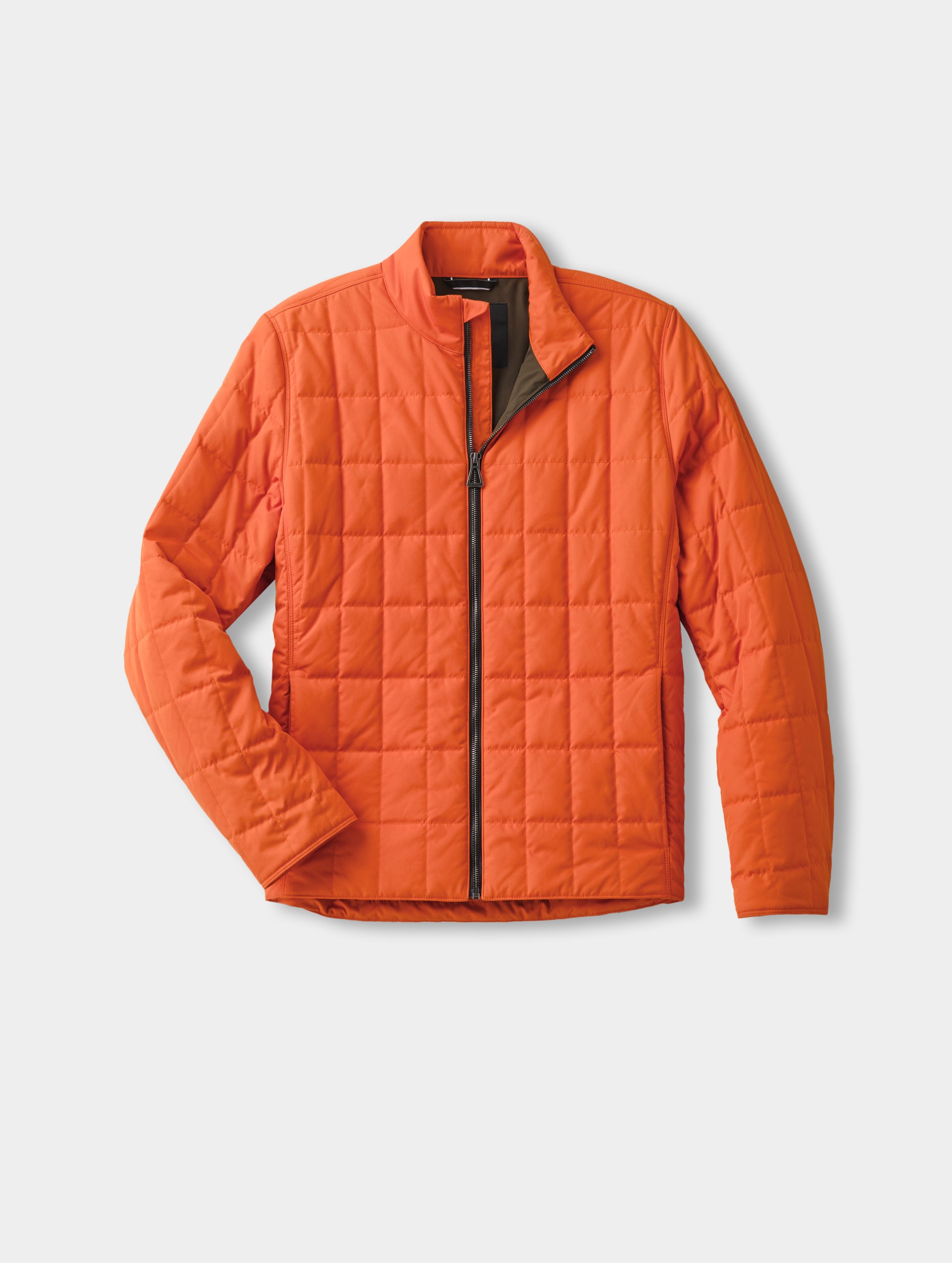 Flat lay of the Alto Jacket 2.0 in Autumn Orange from AETHER Apparel.