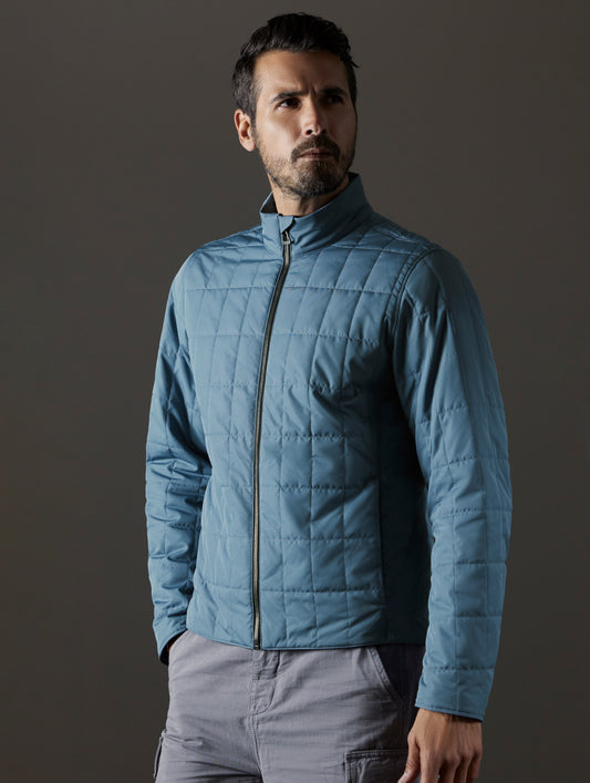 Man wearing blue jacket from AETHER Apparel