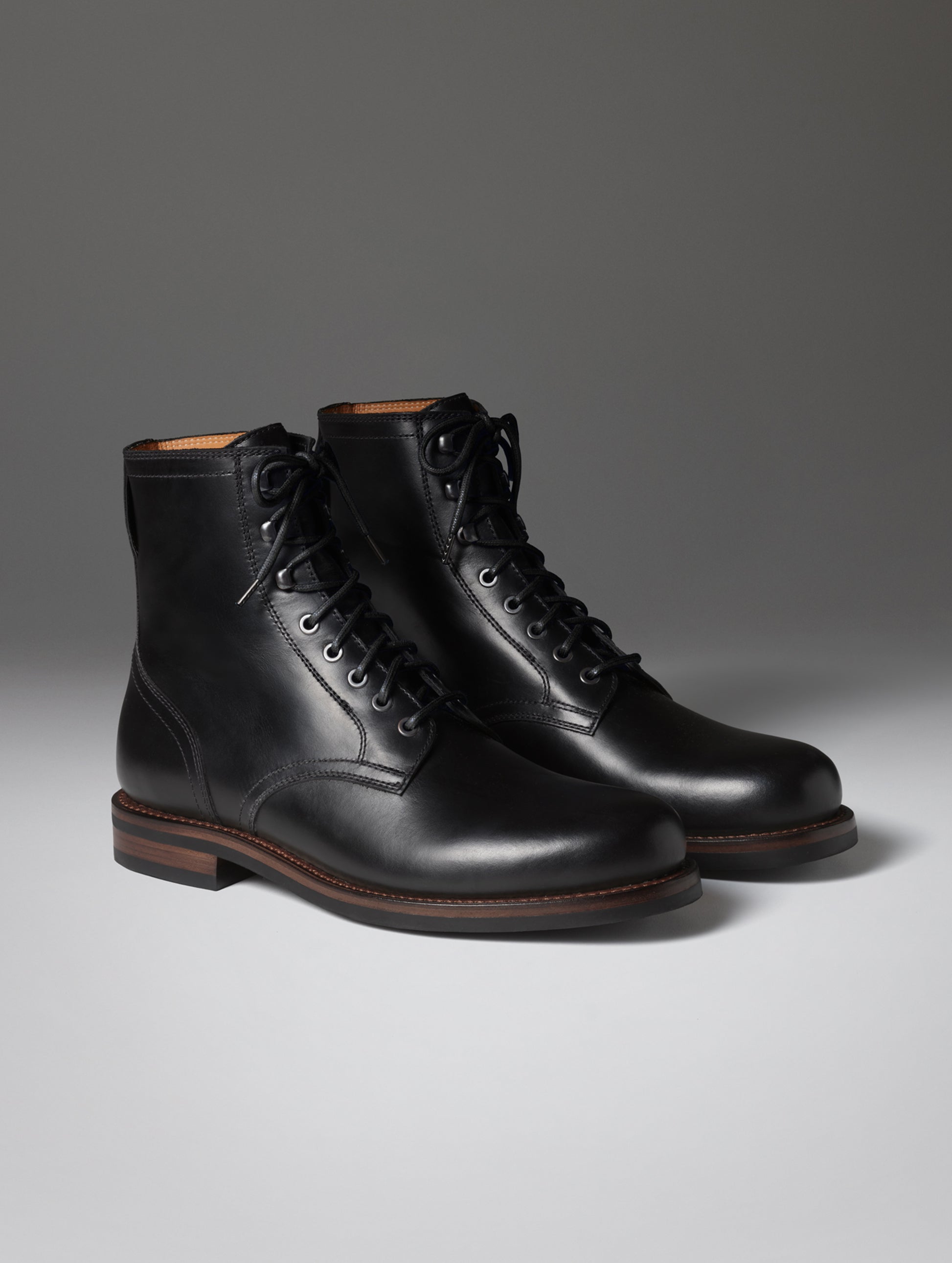 Front angled view of the Avenue Boot in Onyx Black with black laces from AETHER Apparel.