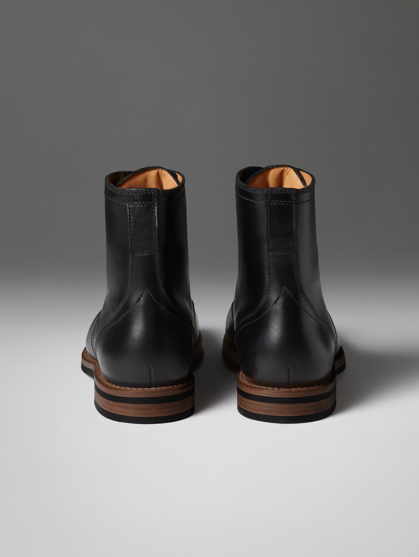 Rear view of the Avenue Boot in Onyx Black from AETHER Apparel.