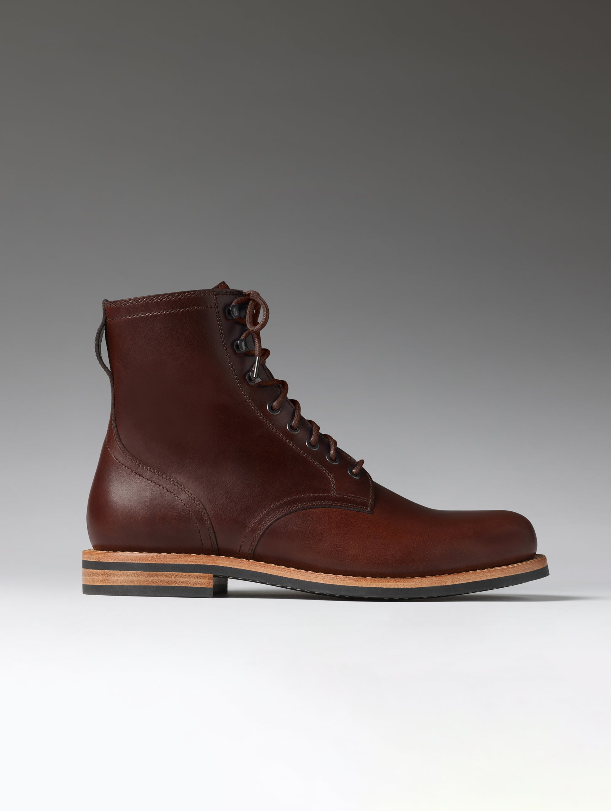 Side profile view of the Avenue Boot in Rustic Brown from AETHER Apparel.