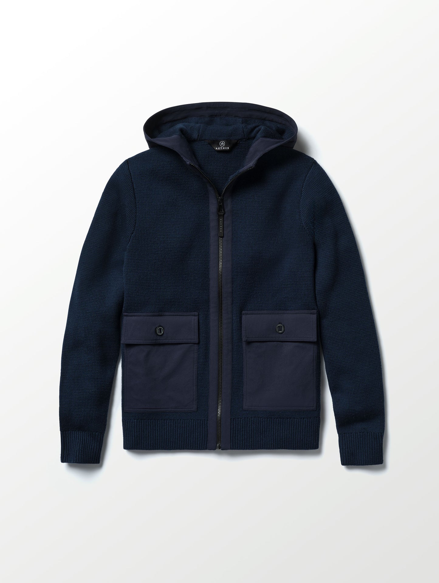 Flat lay image of Benson Full-Zip Sweater in Total Eclipse dark blue from AETHER Apparel. 