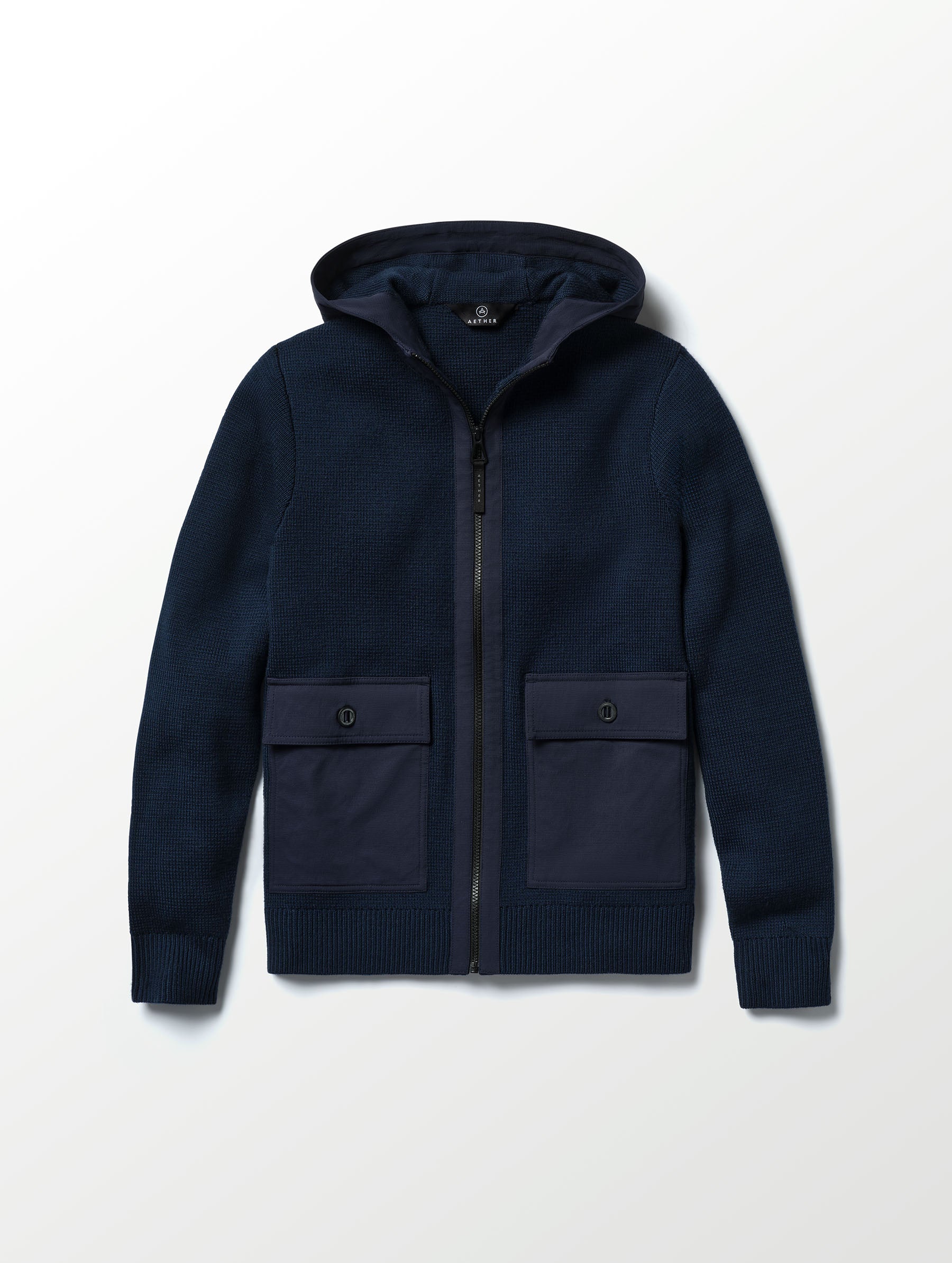 Flat lay image of Benson Full-Zip Sweater in Total Eclipse dark blue from AETHER Apparel. 