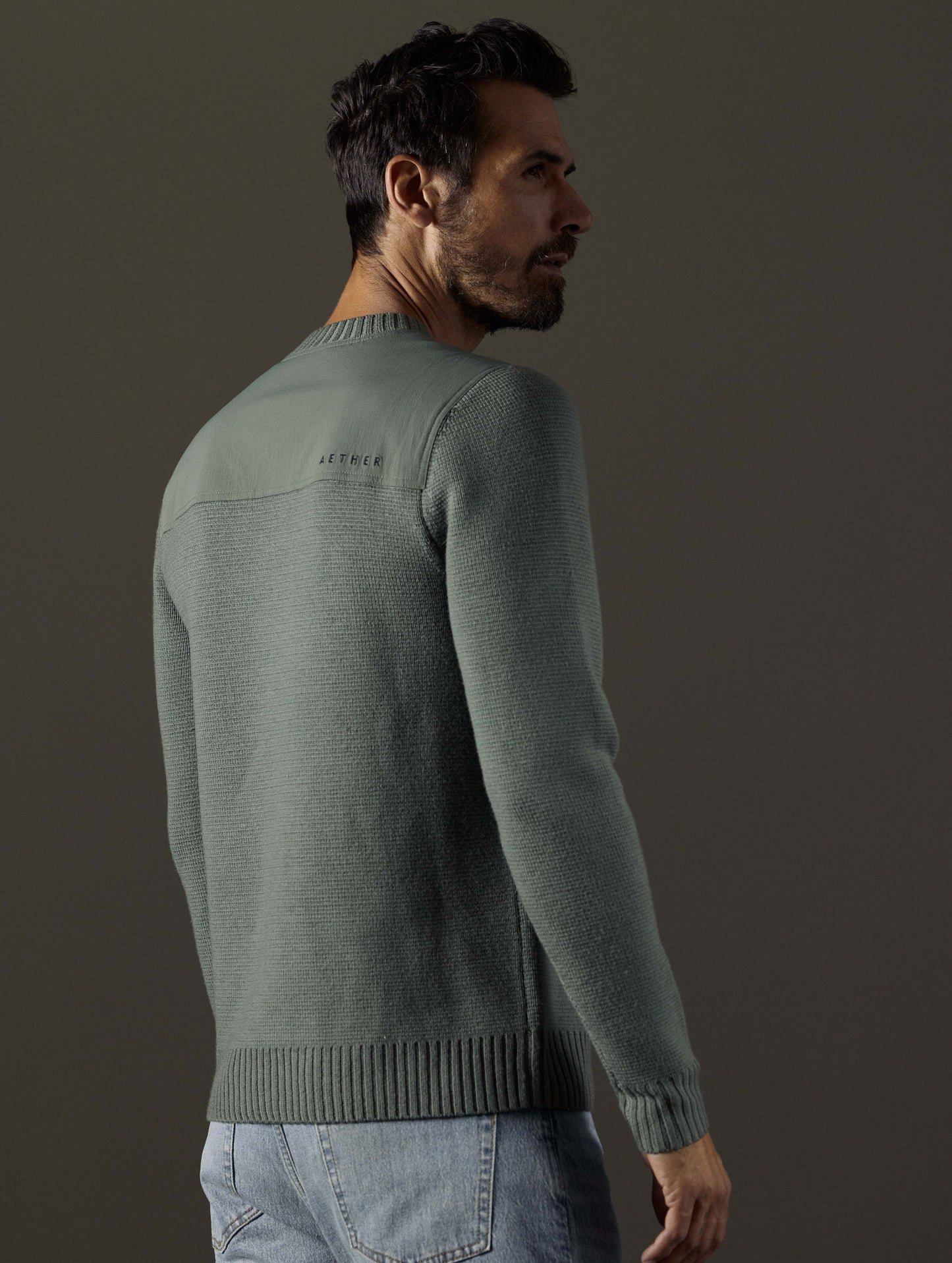 man wearing grey sweater from AETHER Apparel