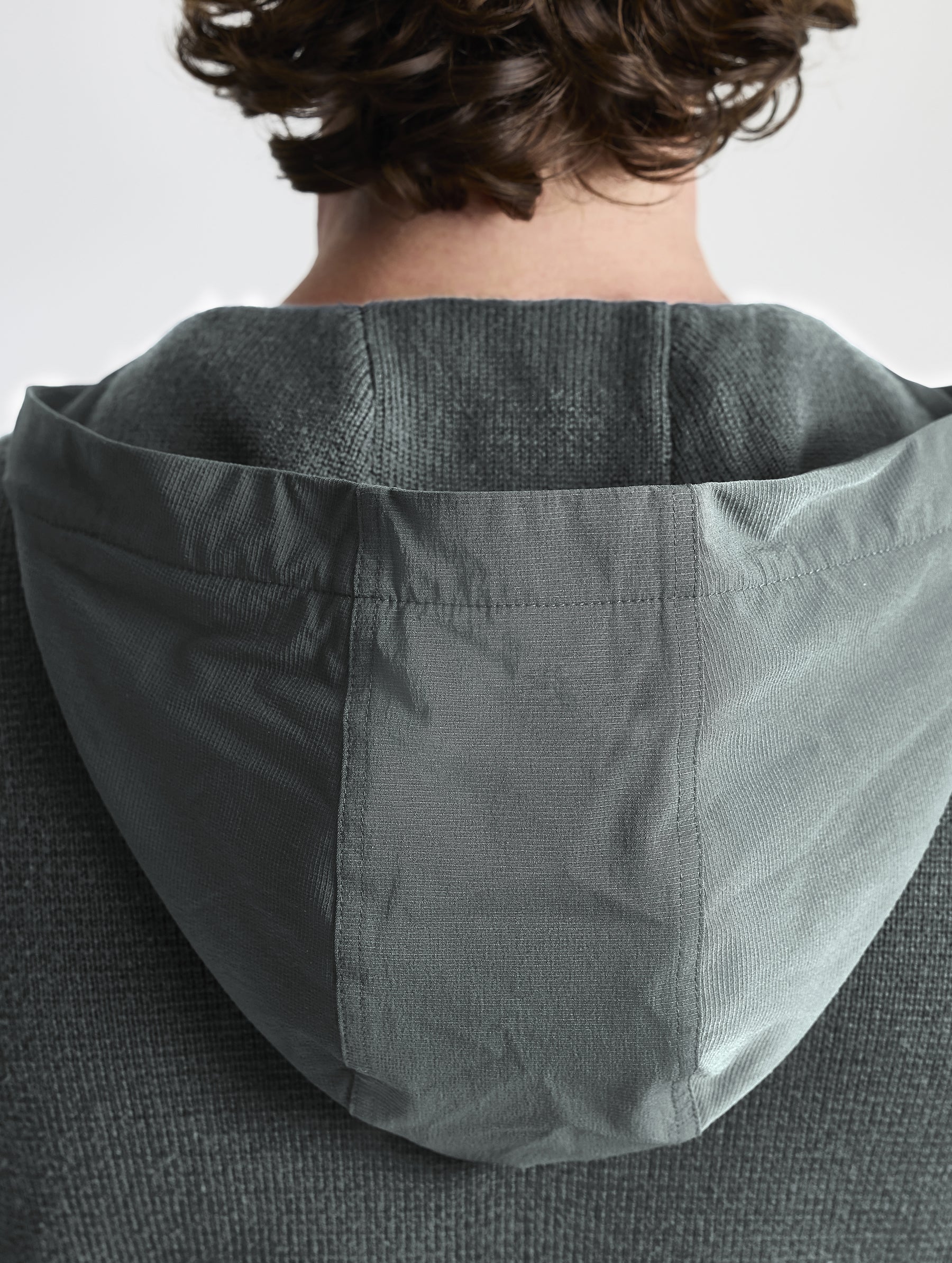 Rear closeup view of hood of Benson Full-Zip Sweater in Gunmetal grey from AETHER Apparel.