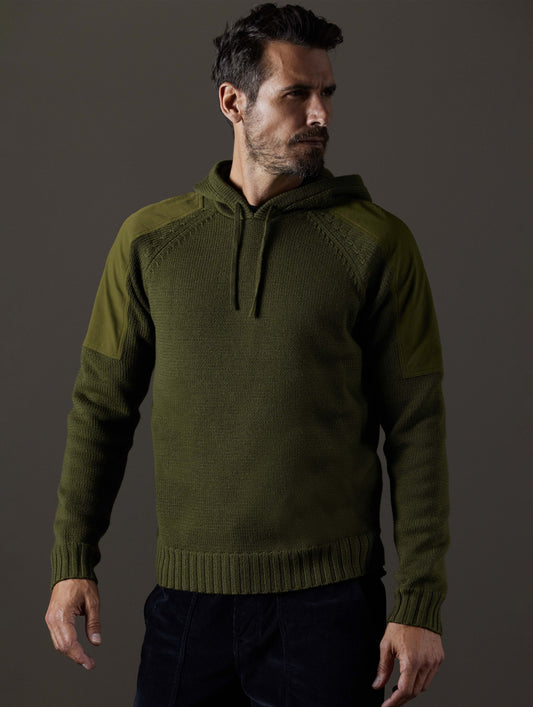 Front body view of man wearing Benson Hooded Sweater in Command Green from AETHER Apparel.