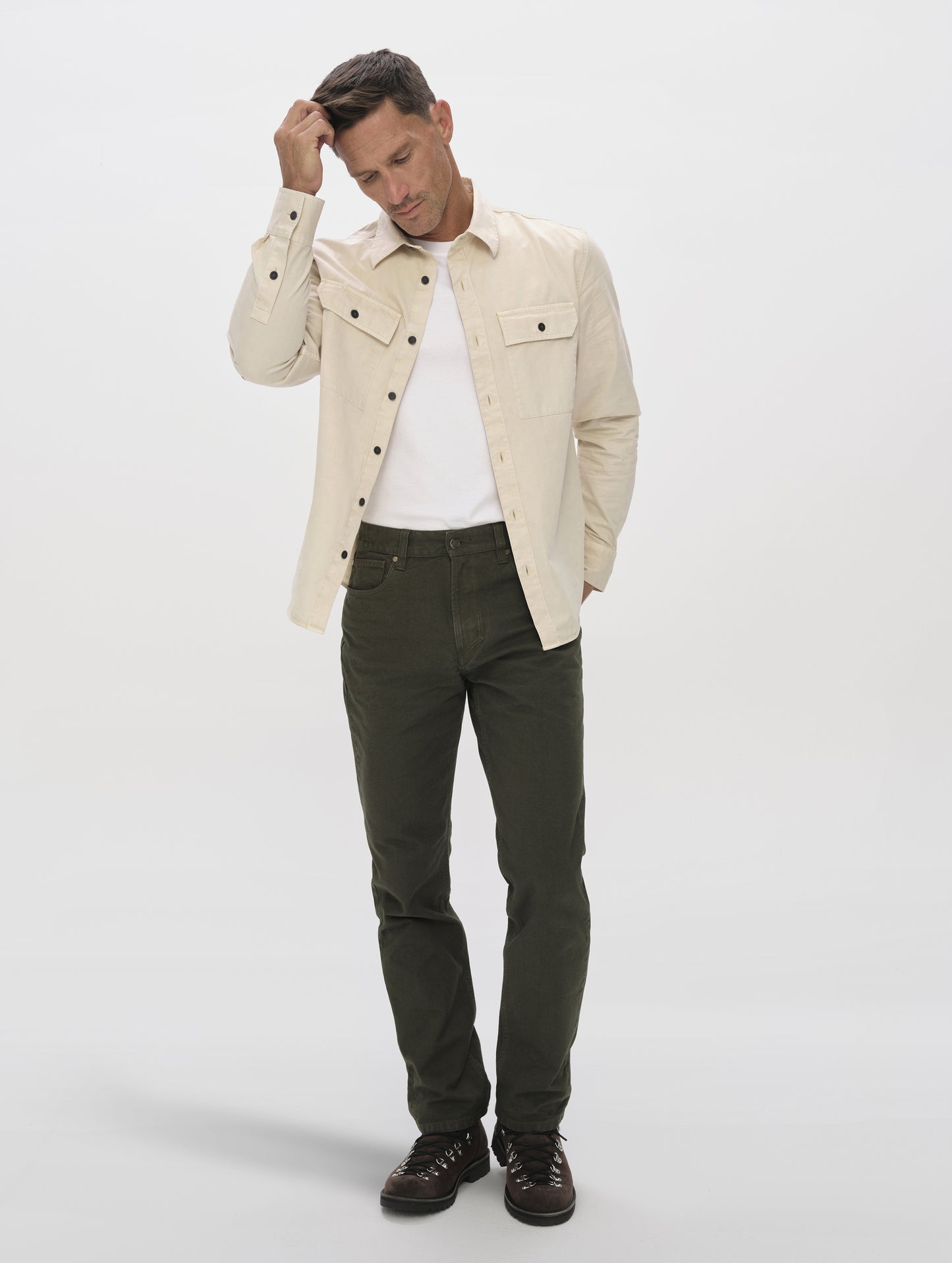 Front full-body view of man wearing the Caden Work Shirt in Bone from AETHER Apparel.