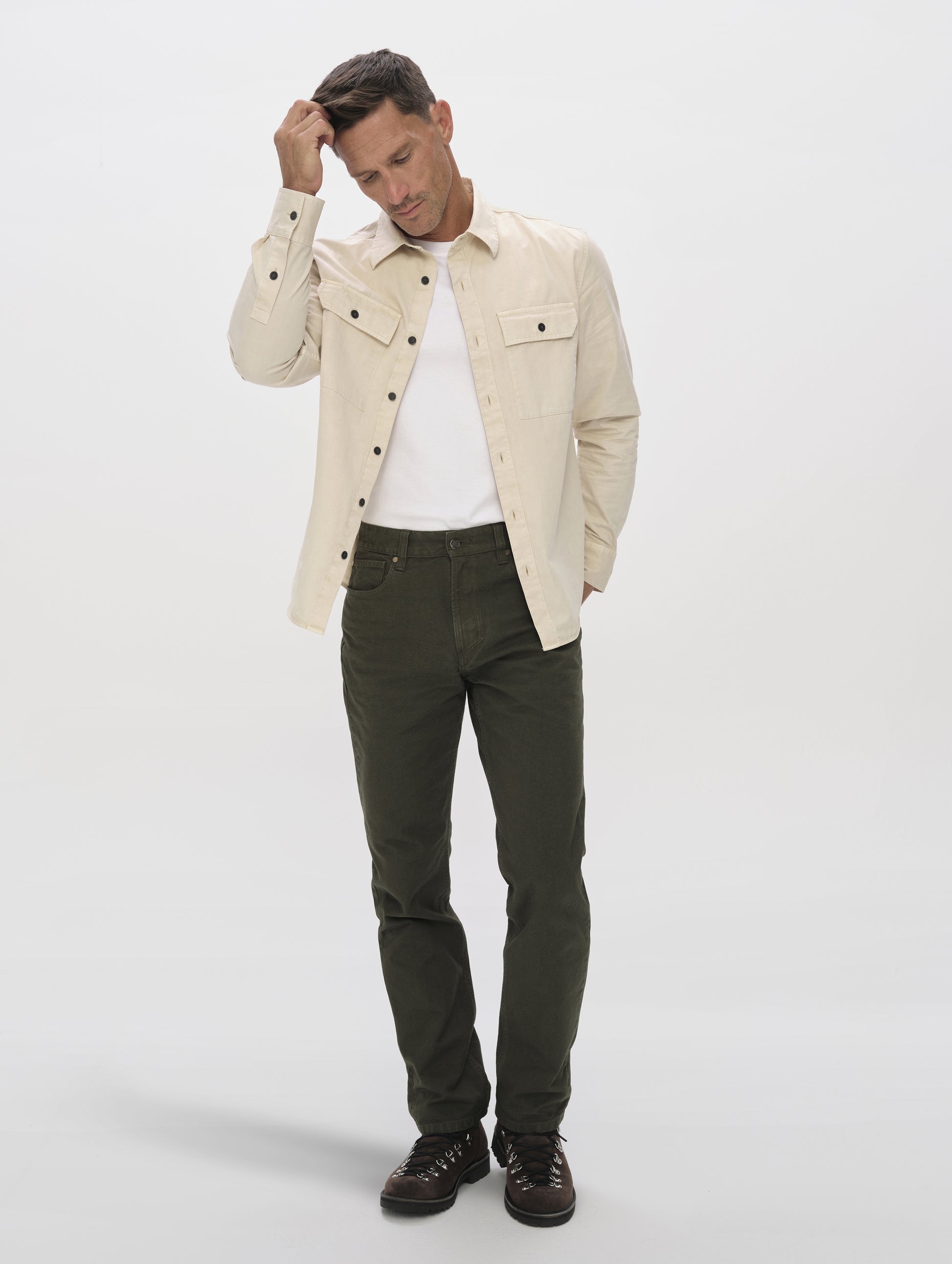 Front full-body view of man wearing the Caden Work Shirt in Bone from AETHER Apparel.