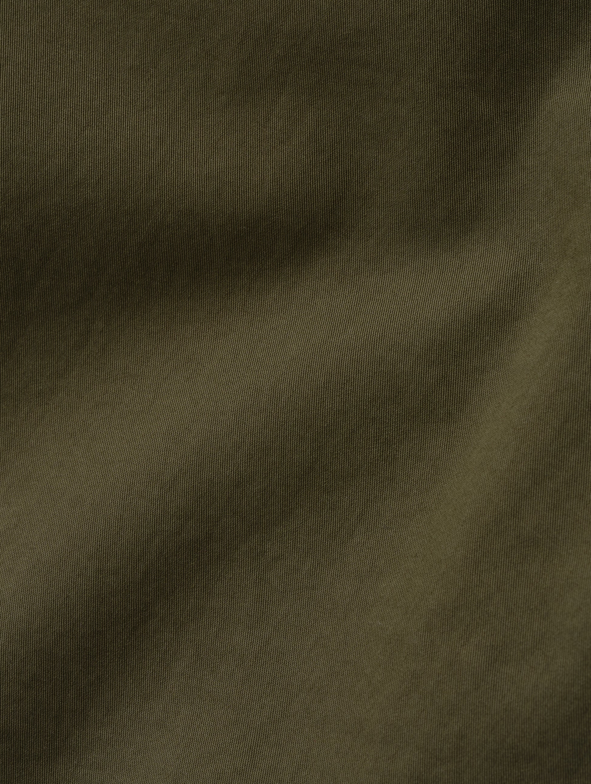 Closeup detailed view of the combed cotton construction on the Caden Work Shirt in Cadet from AETHER Apparel.