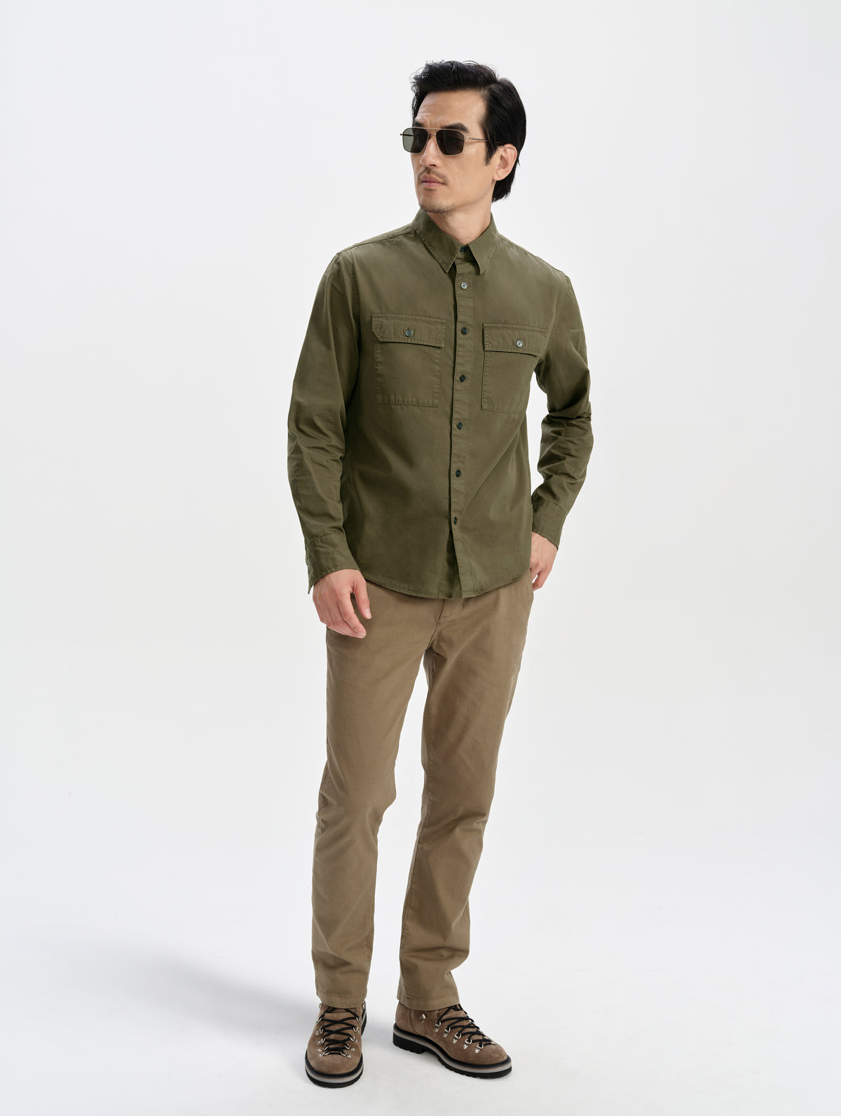 Front full-body view of man wearing the Caden Work Shirt in Cadet from AETHER Apparel.