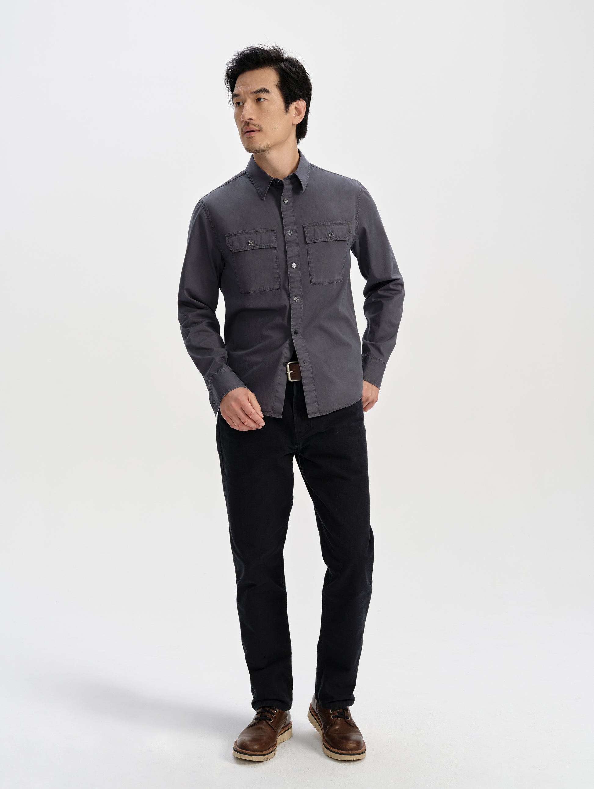 Front full-body view of man wearing the Caden Work Shirt in Graphite from AETHER Apparel.