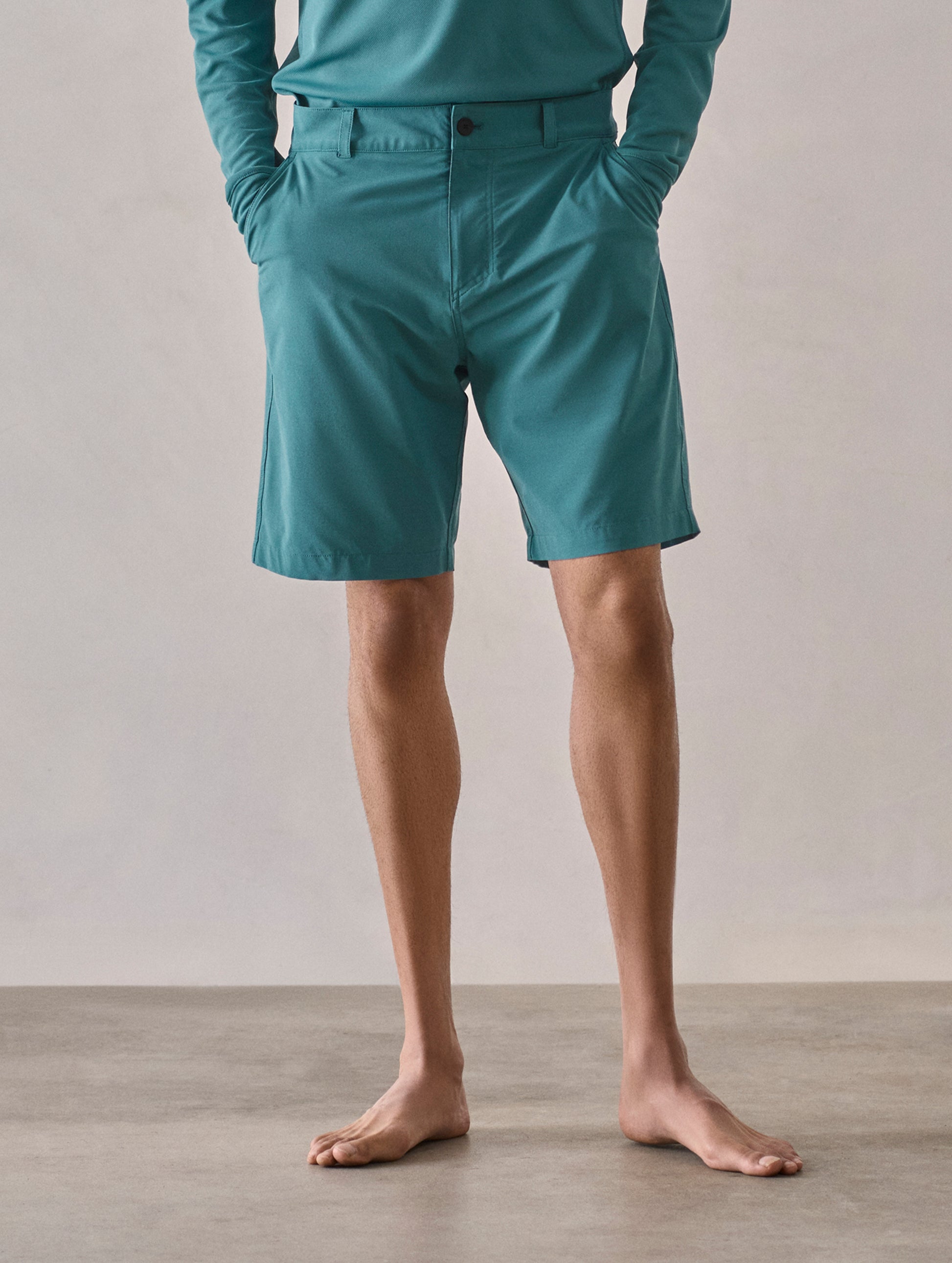 Front lower-body view of man wearing Catalina Submersible Short in Aqua Blue from AETHER Apparel.