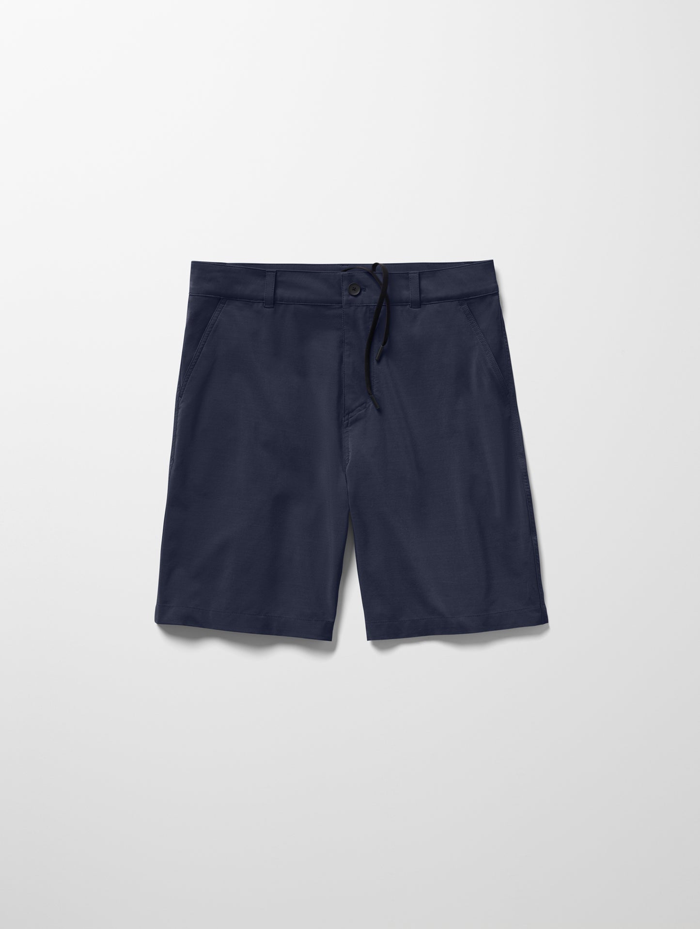 Flay lay image of men’s Catalina Submersible Short in Total Eclipse dark blue from AETHER Apparel.