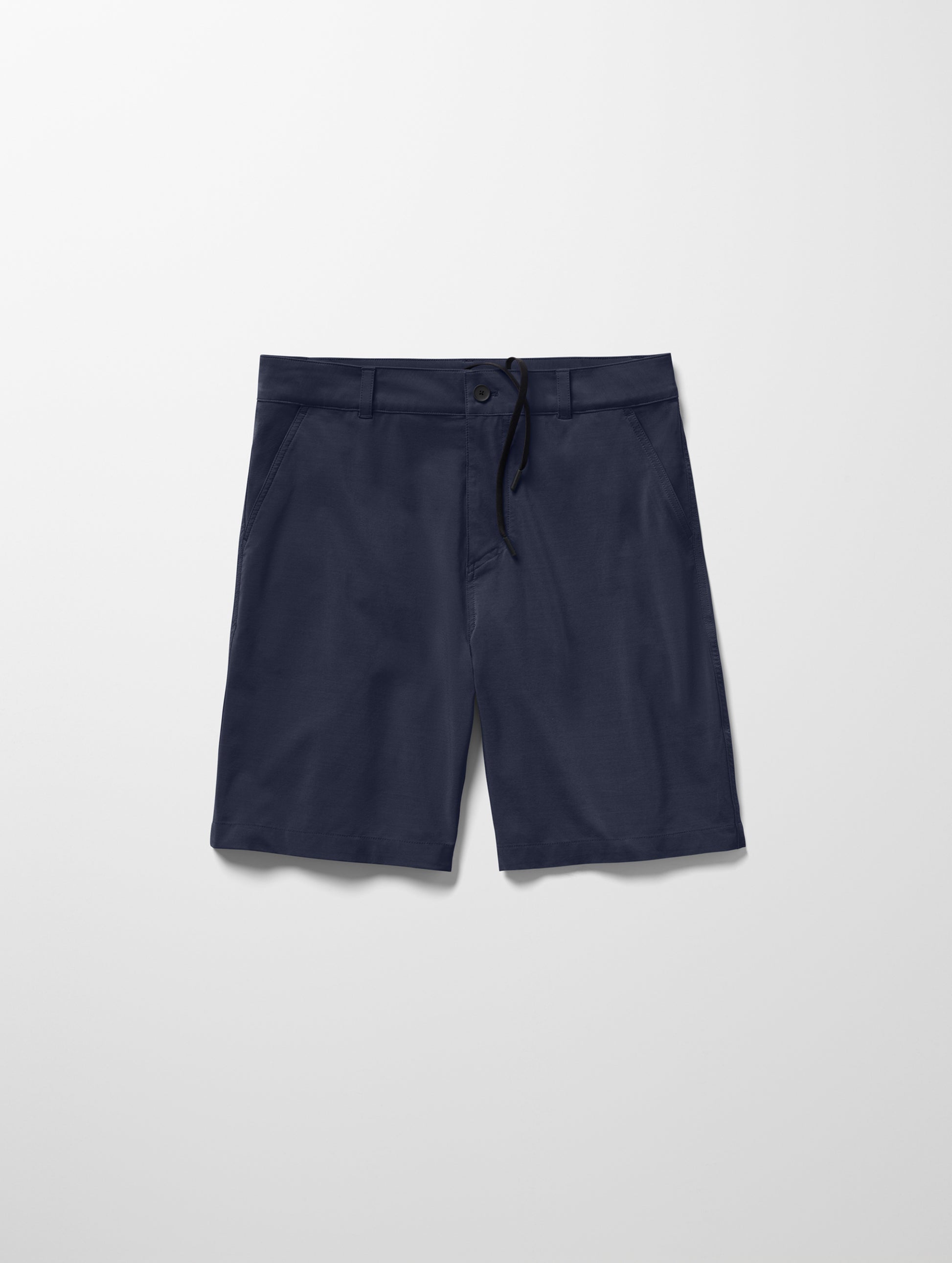 Flay lay image of men’s Catalina Submersible Short in Total Eclipse dark blue from AETHER Apparel.