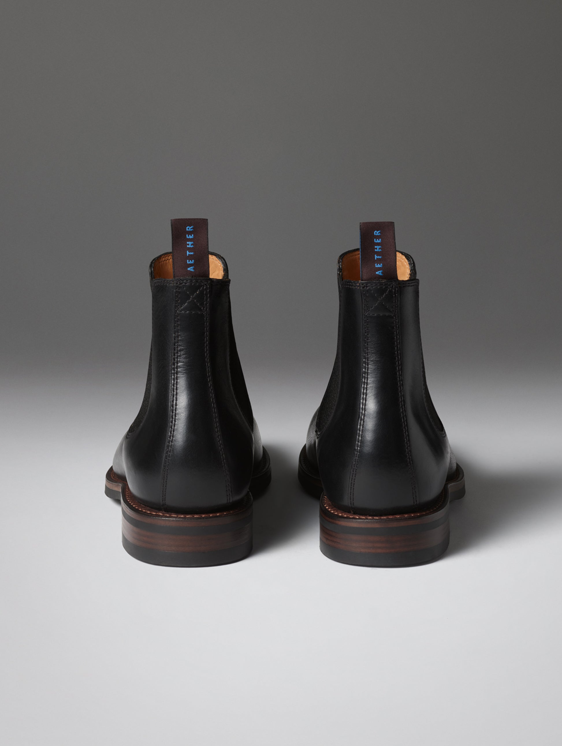Rear view of the City Chelsea Boot in Onyx Black from AETHER Apparel.